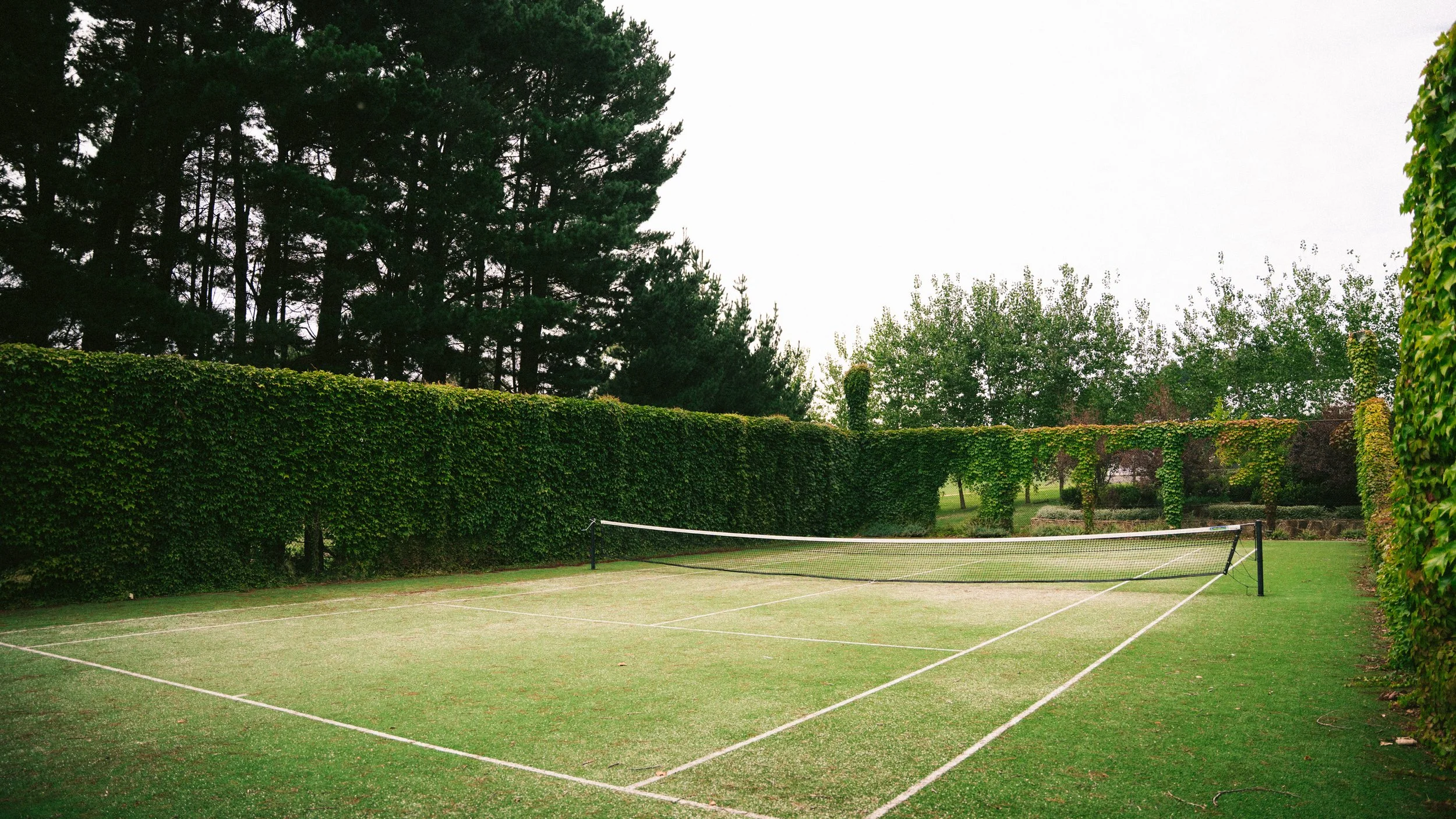 Private tennis court at a luxury farm stay in NSW — Waldara Estate, Edith NSW, near Sydney and the Blue Mountains