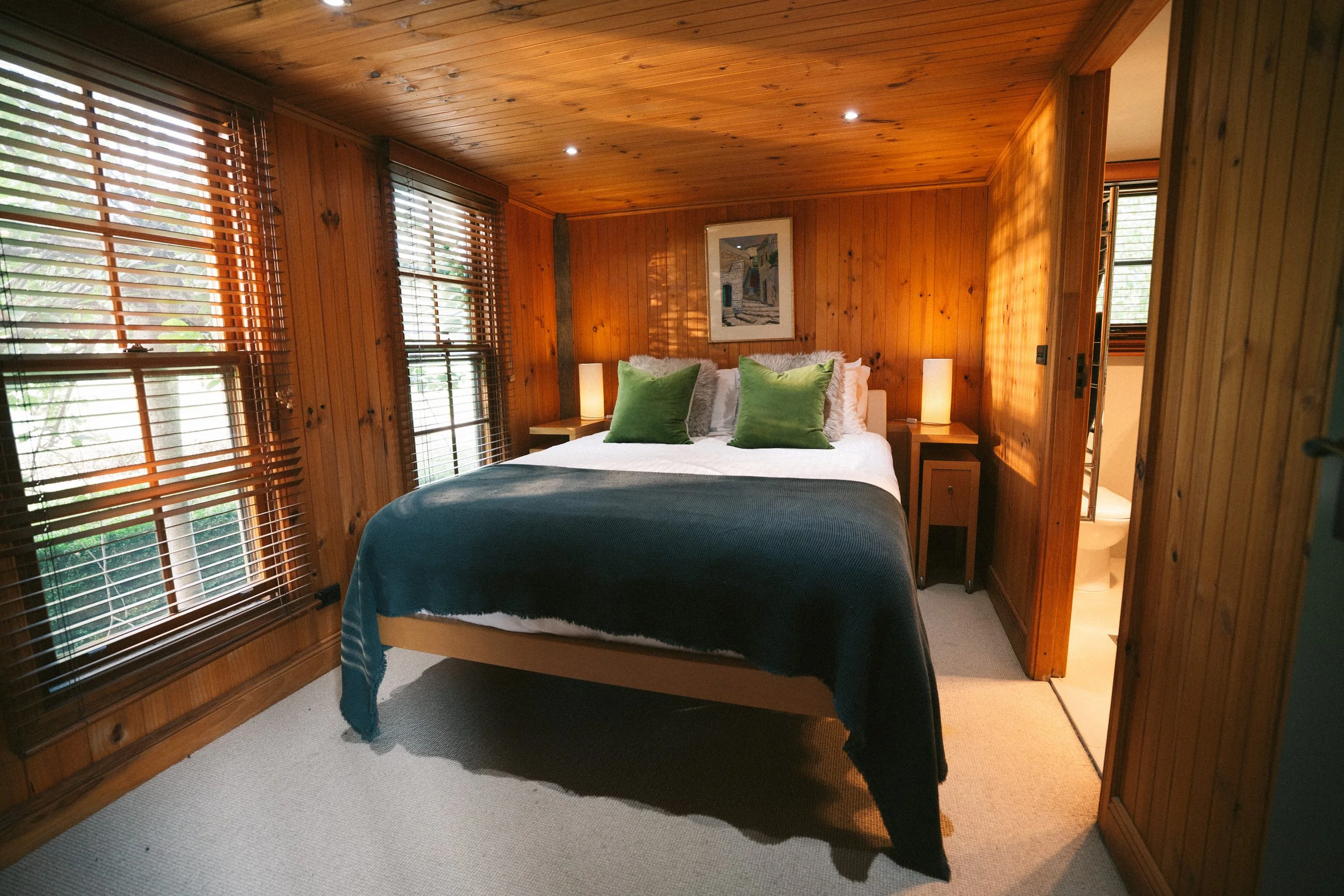 Cosy timber bedroom at a luxury farm stay in NSW — Waldara Estate, Edith NSW, near Sydney and the Blue Mountains