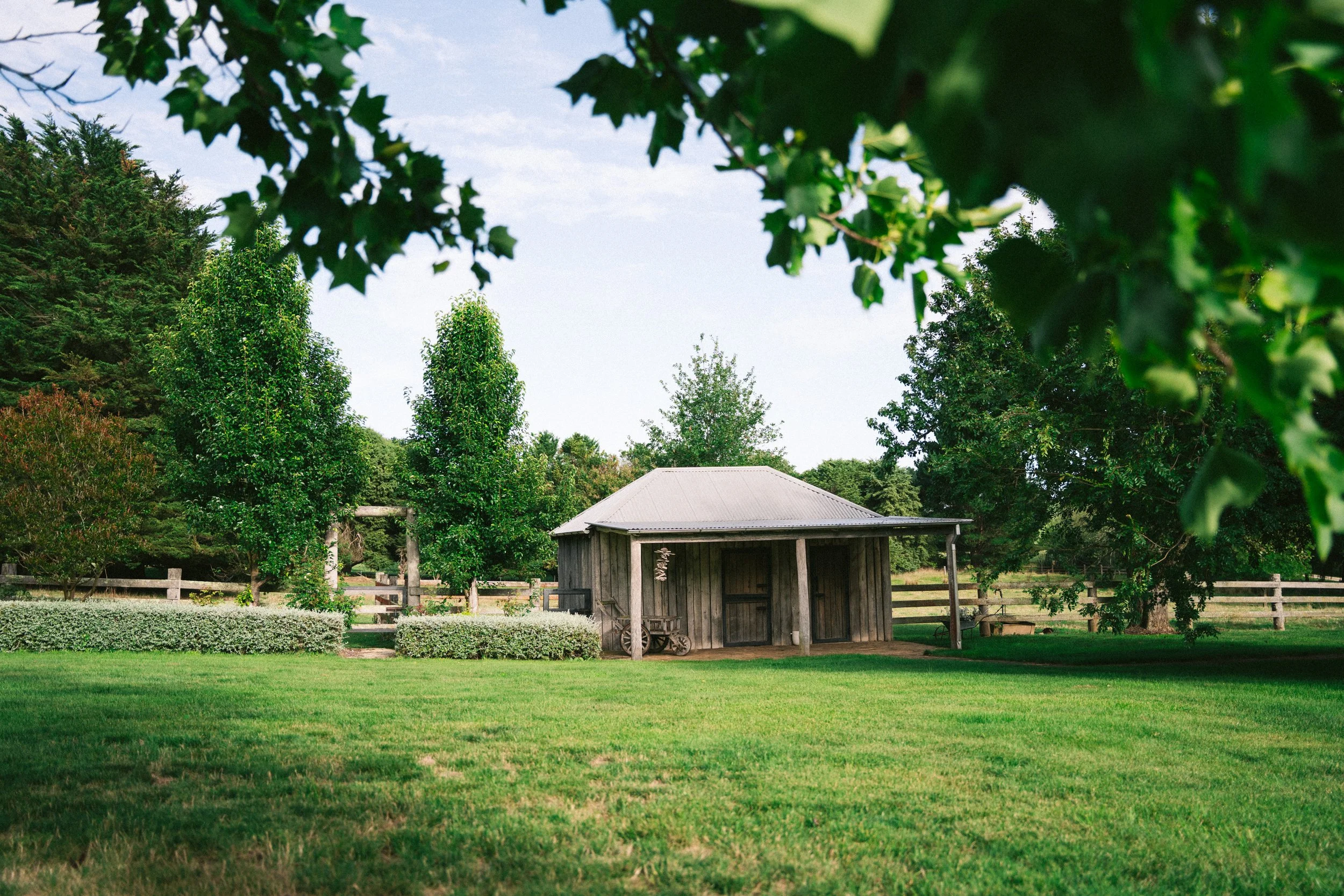 Rustic farm shed and open lawn at a luxury farm stay in NSW — Waldara Estate, Edith NSW, near Sydney and the Blue Mountains