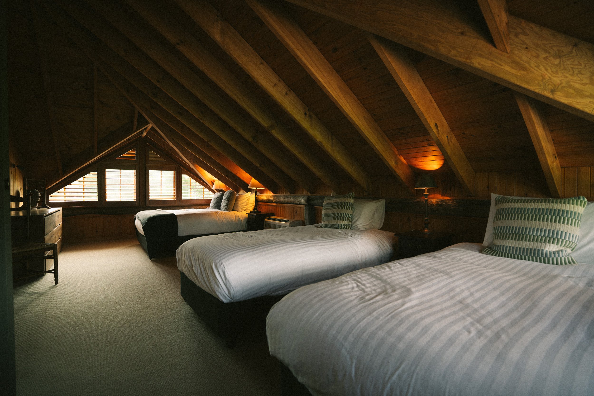 Attic dormitory bedroom at a luxury farm stay in NSW — Waldara Estate, Edith NSW, near Sydney and the Blue Mountains