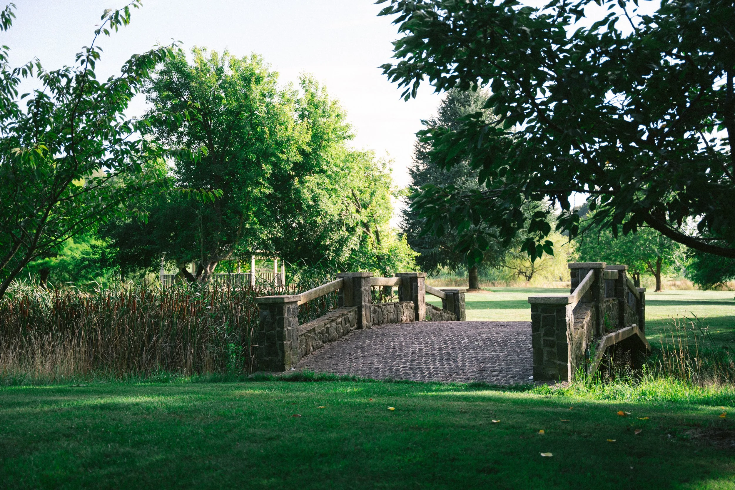 Stone bridge and gardens at a luxury farm stay in NSW — Waldara Estate, Edith NSW, near Sydney and the Blue Mountains