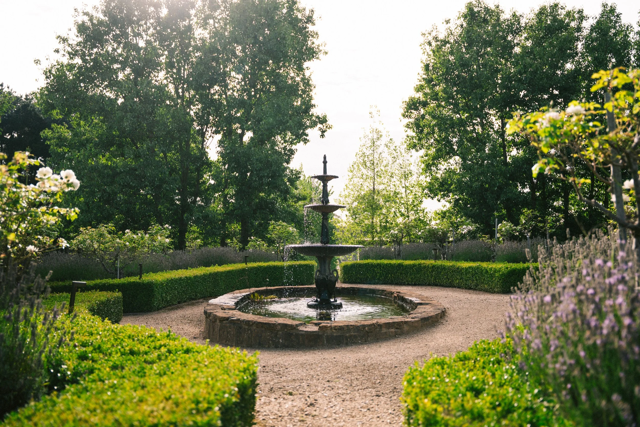 Manicured garden fountain at a luxury farm stay in NSW — Waldara Estate, Edith NSW, near Sydney and the Blue Mountains