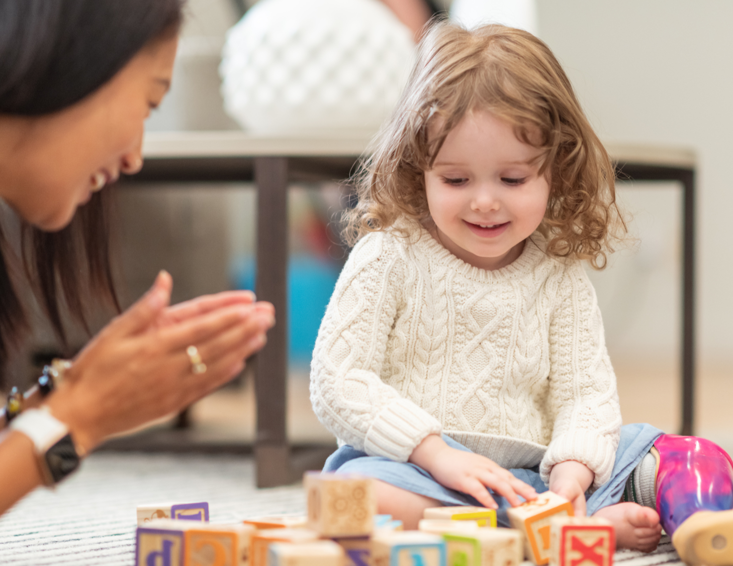 Naturalistic, play-based ABA therapy session with a child engaged in child-led play
