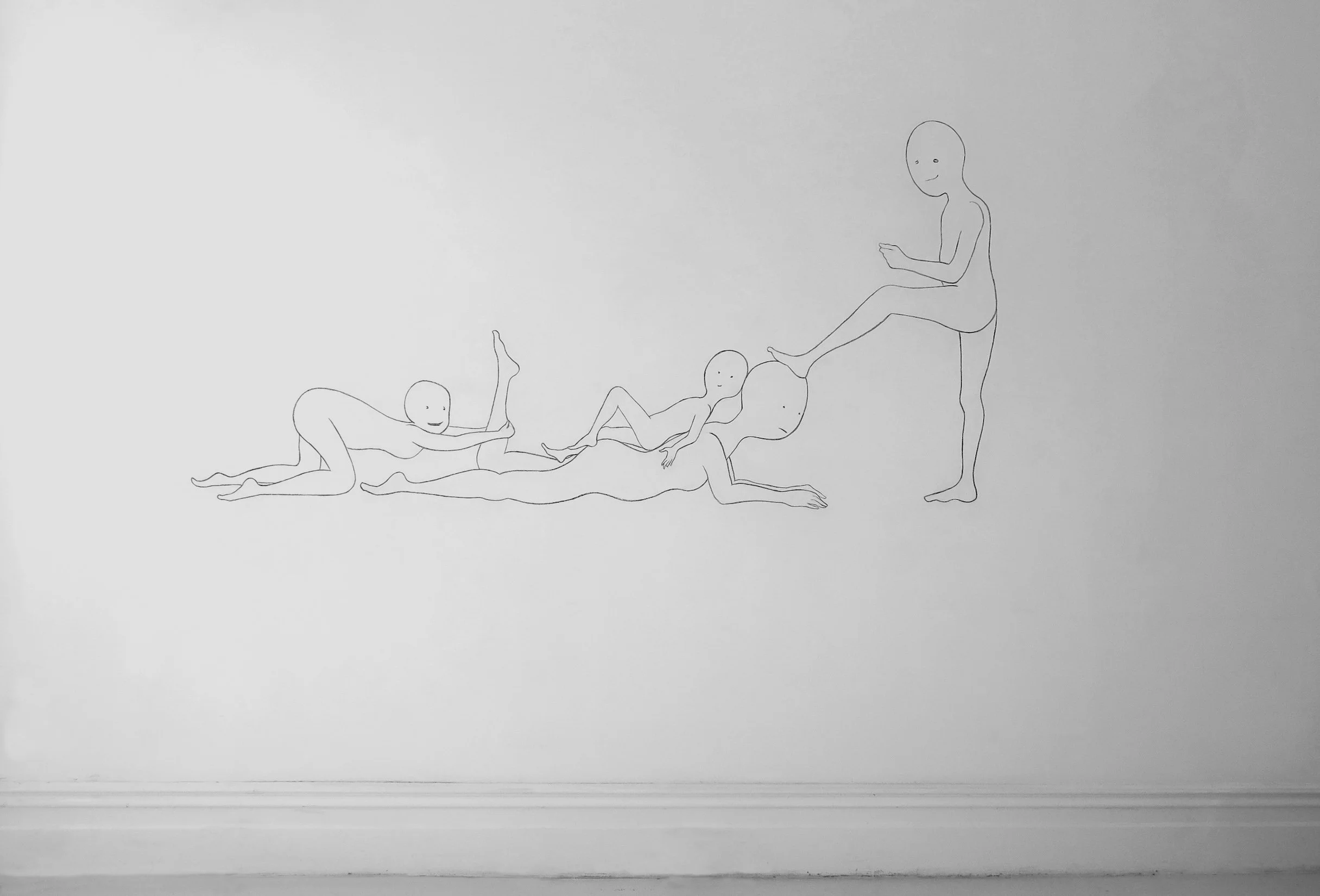 Push and Pull, 2025. Charcoal on wall, 228 x 116 cm
