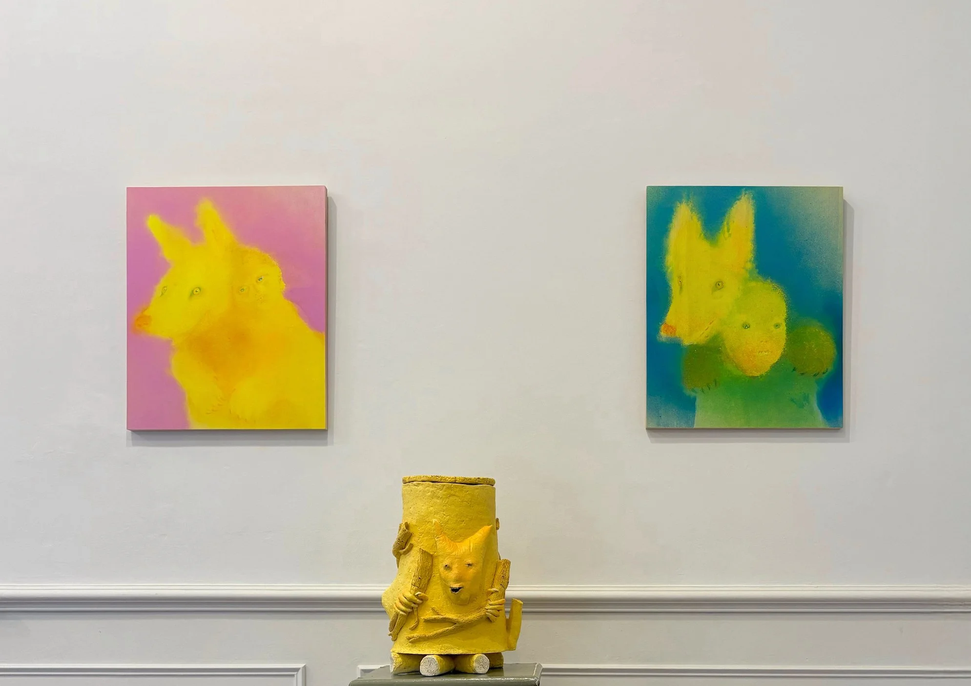 Exhibition detail: Strange Magic’, Andelli Art Gallery, 2025. Left: ‘Big Bad Two’, 2025, acrylic on cradled panel. Middle: Leshy’s Revenge, Glazed ceramic, 2024, Right: ‘Big Bad’, 2024, acrylic on cradled panel.