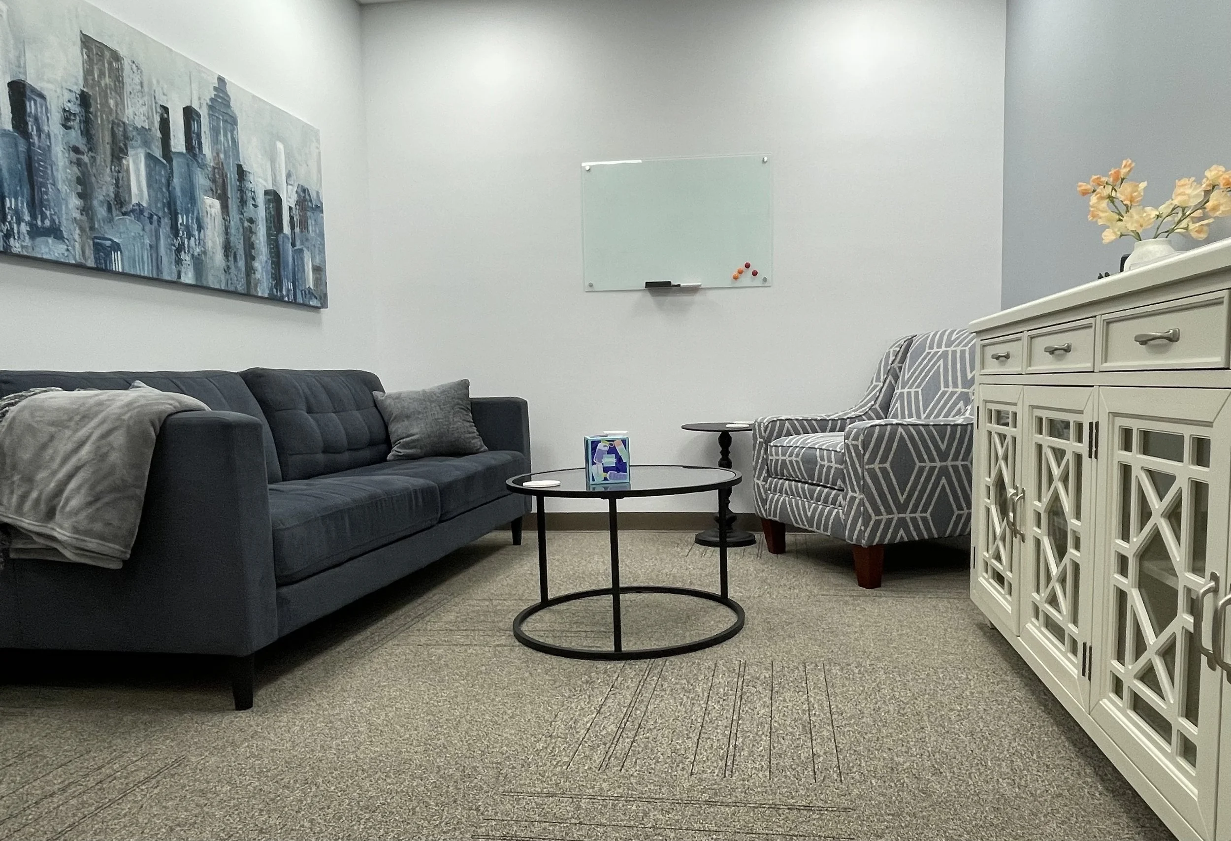 Photo of counseling office with calming colors. Are you feeling stressed or anxious? We can help you meet your goals with CBT, DBT or EMDR in Indianapolis, IN.