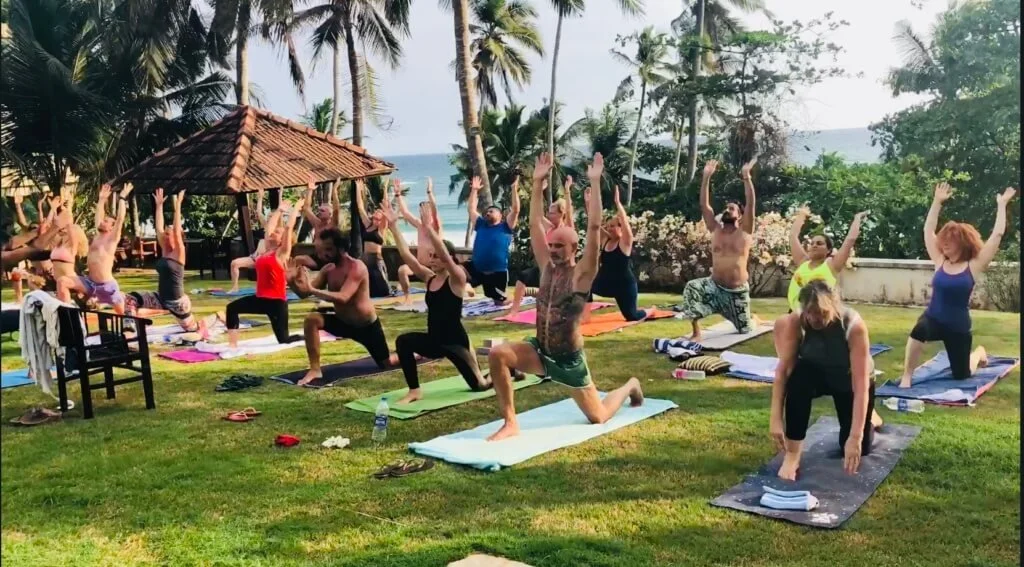 Kerala-Group-Outdoors-Arms-Up.jpeg