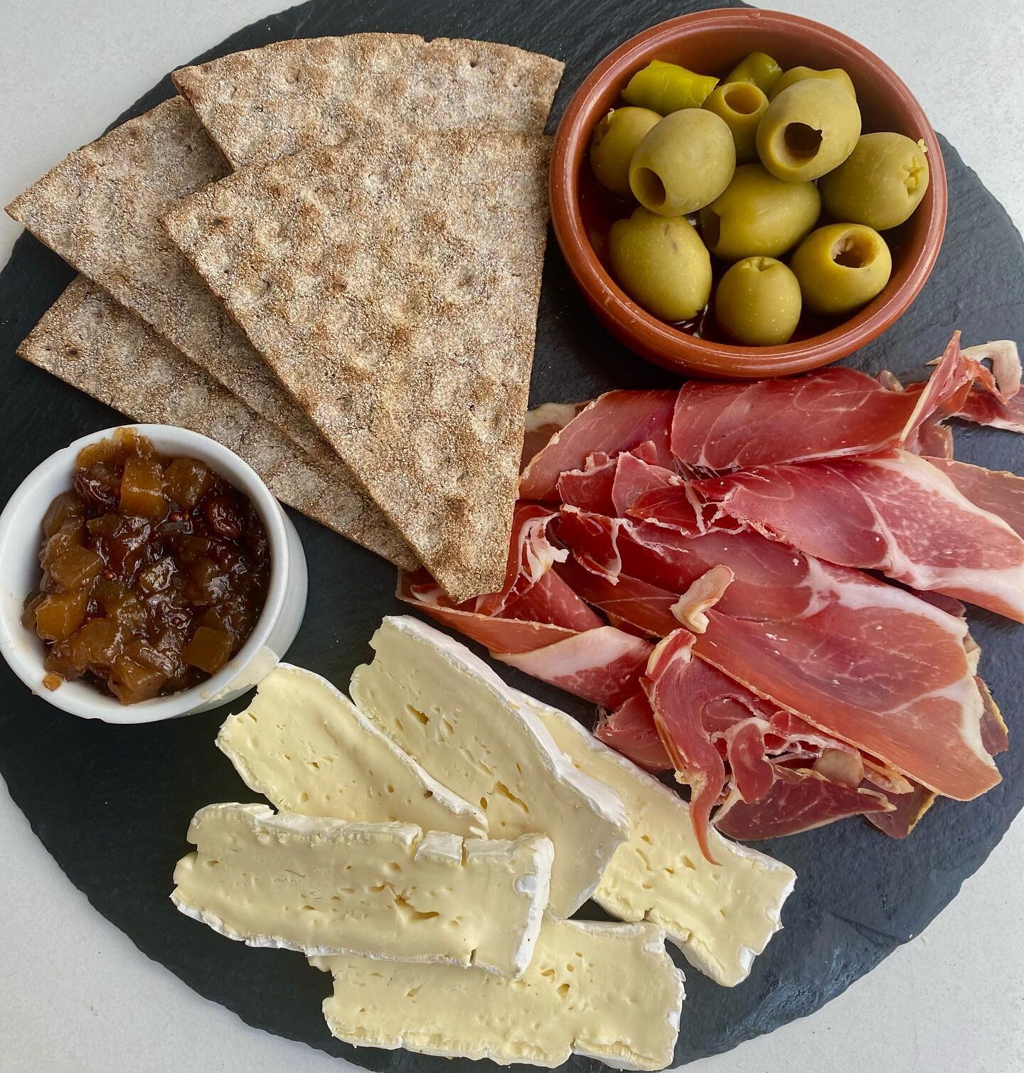 Staying at the @treetop_hideaways in Woodhall Spa? This delicious platter is now available to order for when you stay.

Included is our bestselling Gordal olives, seranno ham, brie, Leksands crispbreads, chutney and a bottle of wine. 

Please message