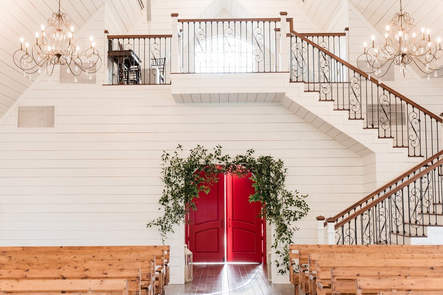 Enhance your wedding ambiance with subtle greenery along the chapel entrance, adding a touch of natural elegance to your ceremony space 🌿⁠
⁠
Venue @thecarriagehousehouston⁠
Photography @emilychappellproductions⁠
⁠
#weddingflorist #weddingflowers #we