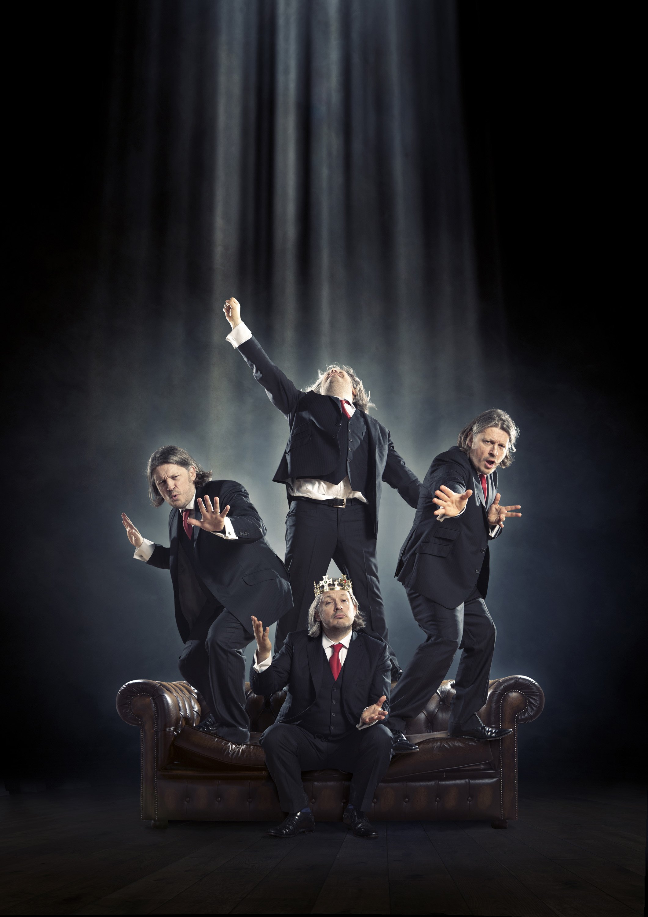 Promo image for richard Herring's comedy show Lord Of The Dance Setee. Multiple versions of richard herring strike different dance poses on a large leather setee. dynamic entertainment portrait photography by Steve Bright, London