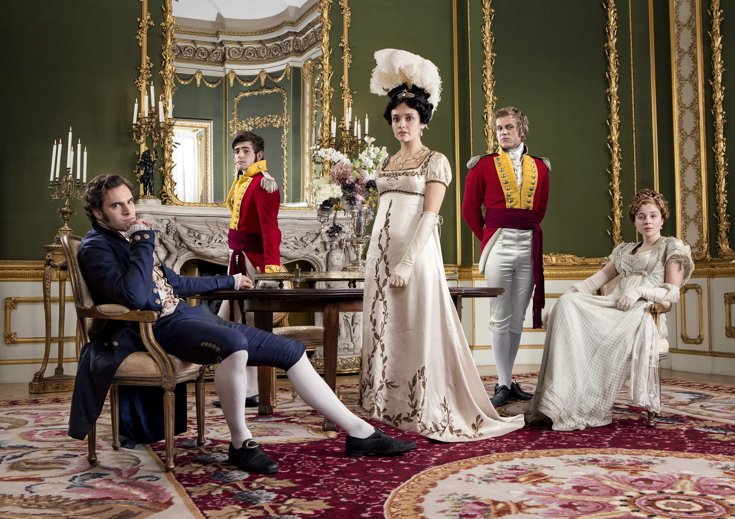 Publicity image for the ITV Drama adaptation of the novel Vanity Fair. 5 characters in period costume stand in an opulent period drawing room. entertainment portrait photography by Steve Bright, London