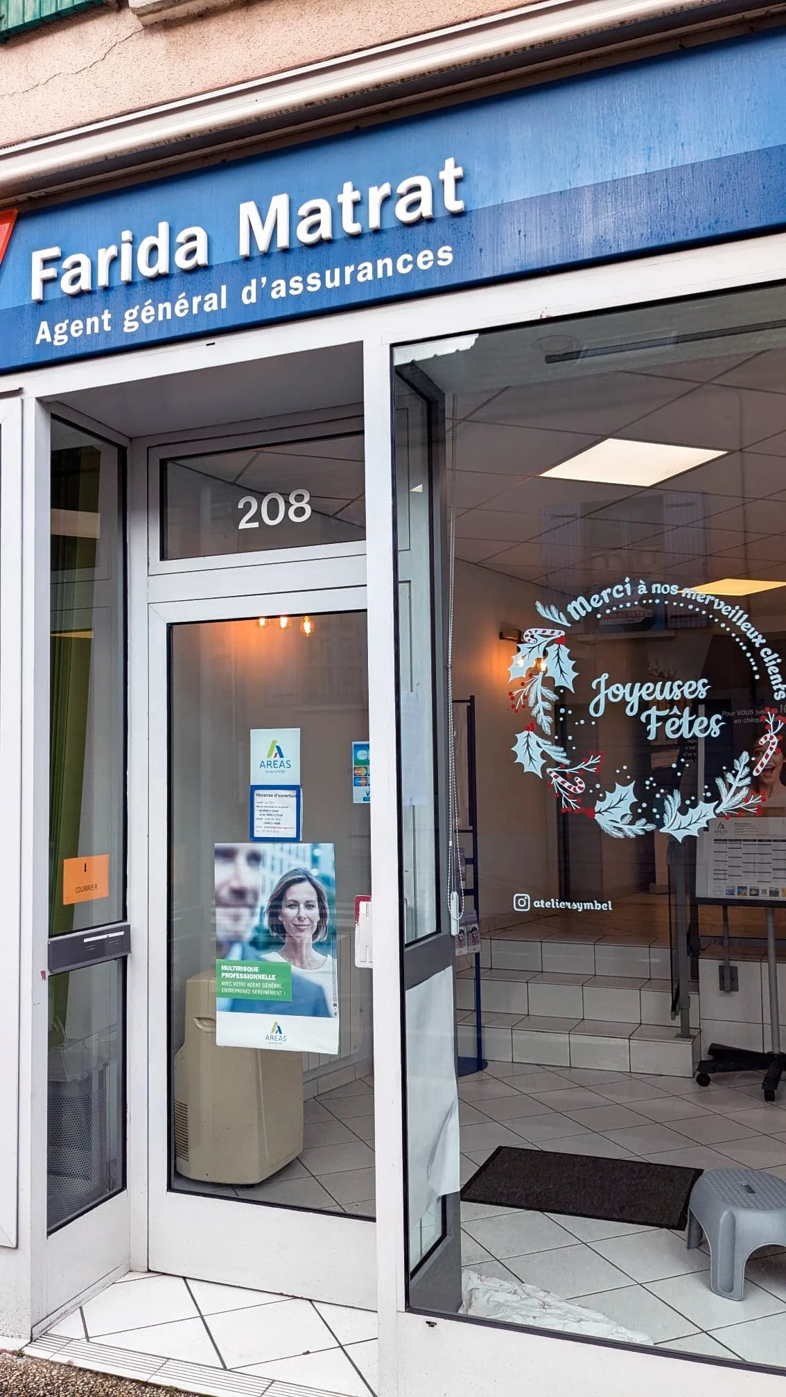 Peinture sur vitrine - Couronne Houx et sucre de canne - Agence Aréas - Vaux sur-Seine