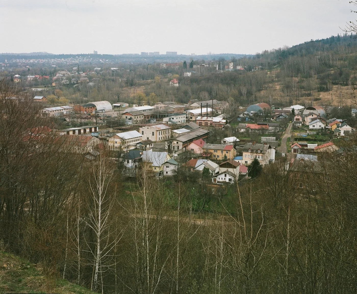 This is a panorama of one of the oldest districts in Boryslav, known locally by the somber name 'Pomerla' (The Dead One). This is the very spot
where the oil rush ignited in the 19th century, transforming a quiet village into the 'Galician
Eldorado.'