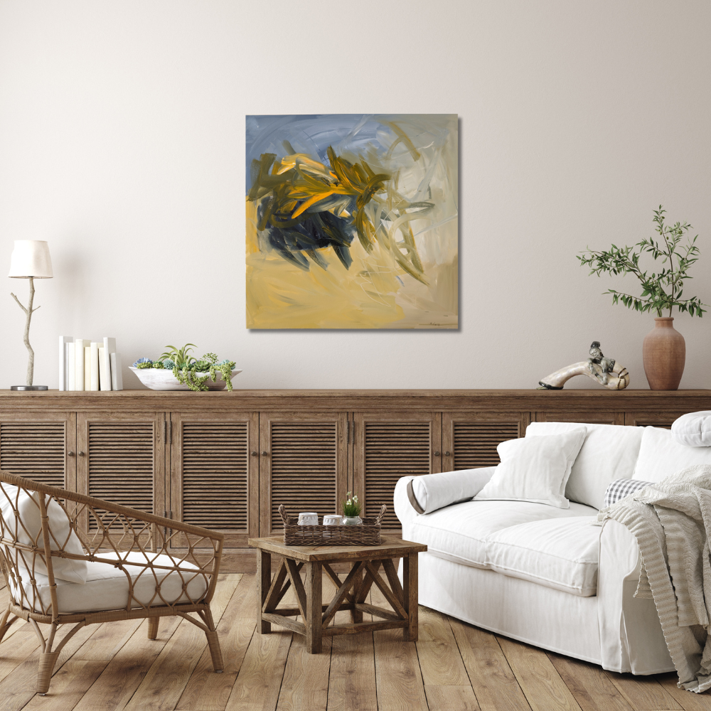 Living room with a white sofa, woven chair, wooden coffee table, and a large abstract painting of a bee on the wall.