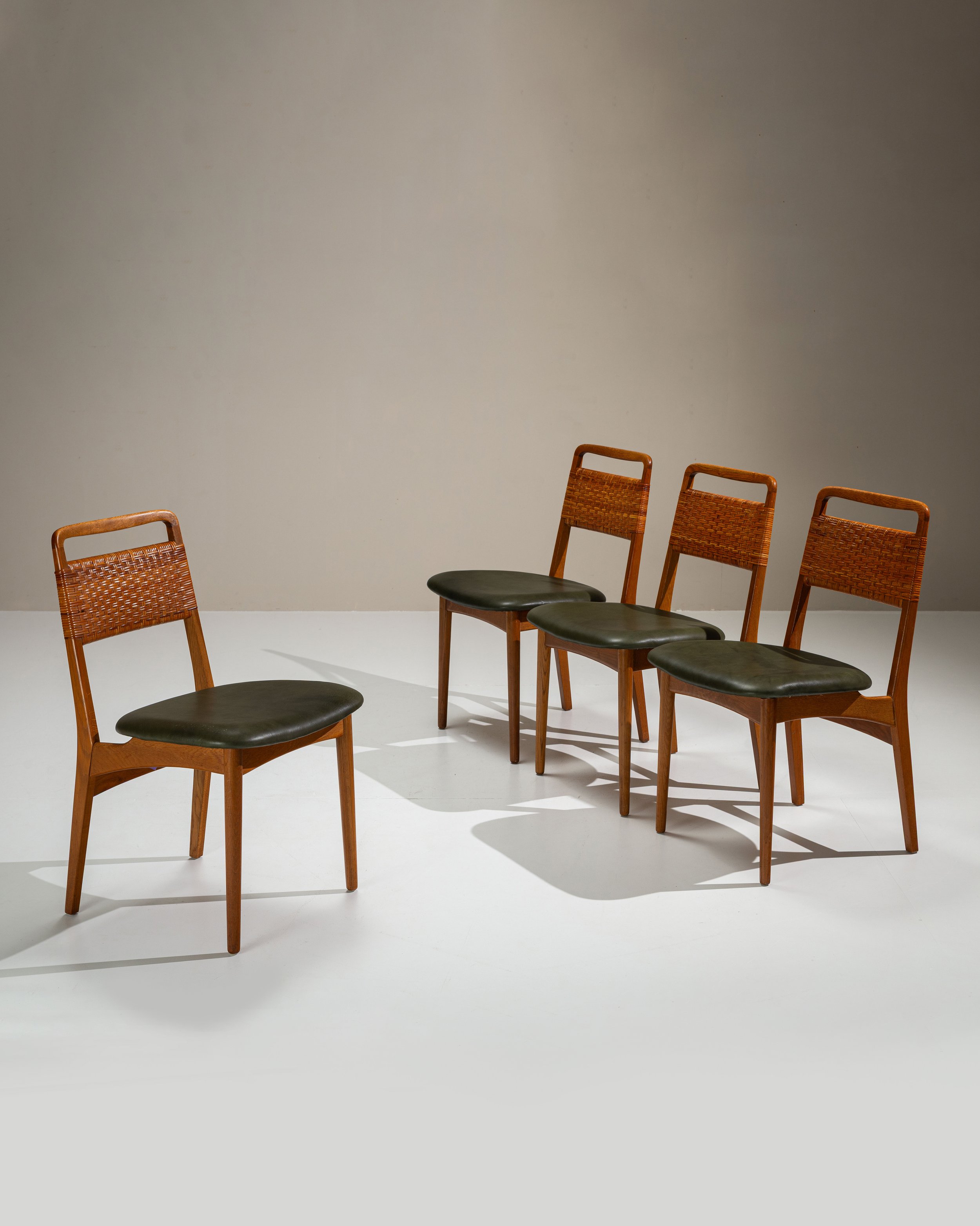 E. Knudsen Dining Chairs