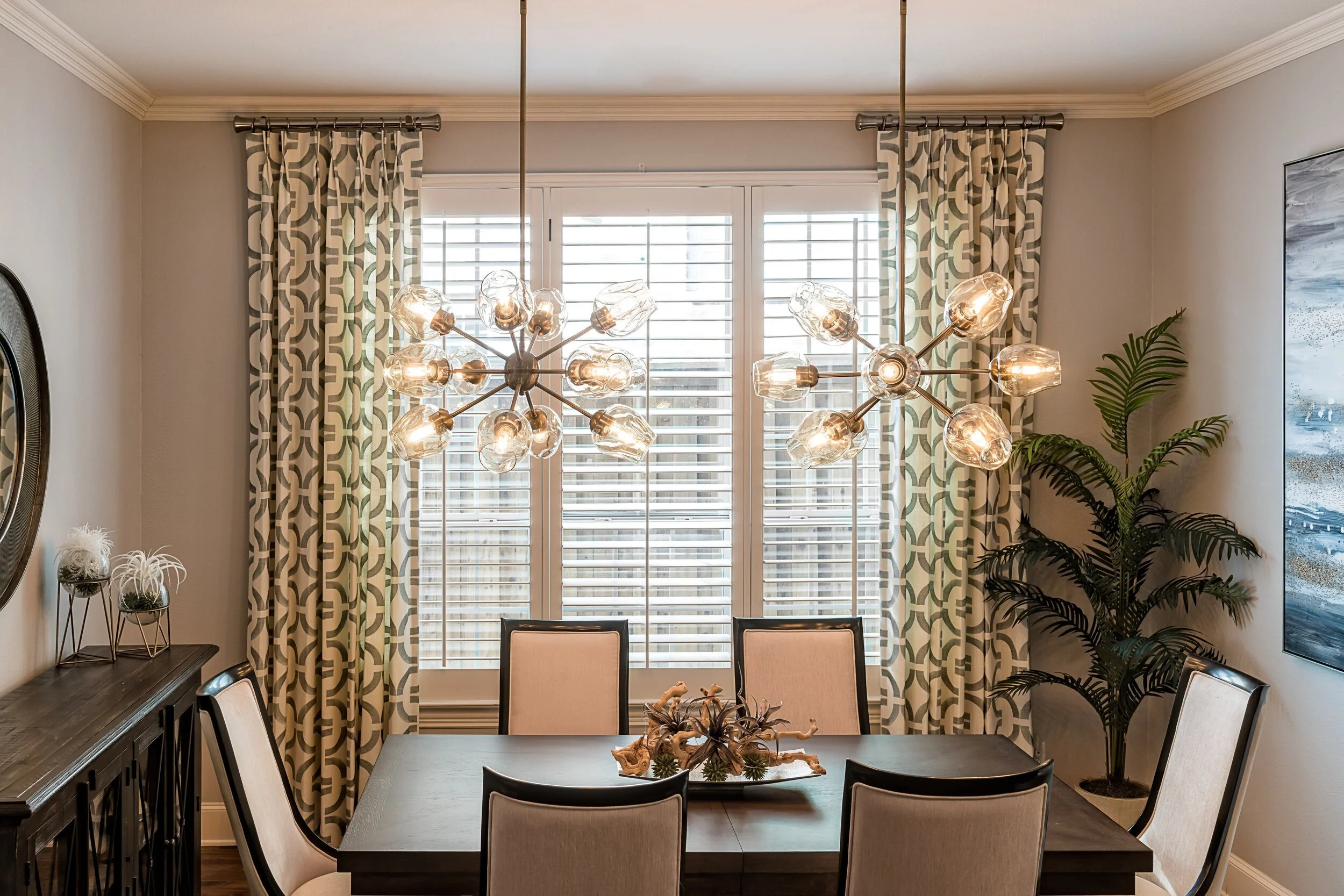 dining room with chandeliers