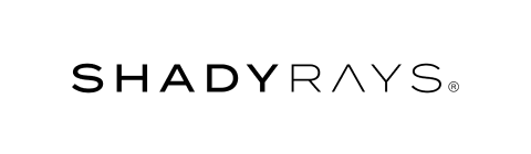 Close-up of a black container with a label reading 'SHAPERS' in bold text.
