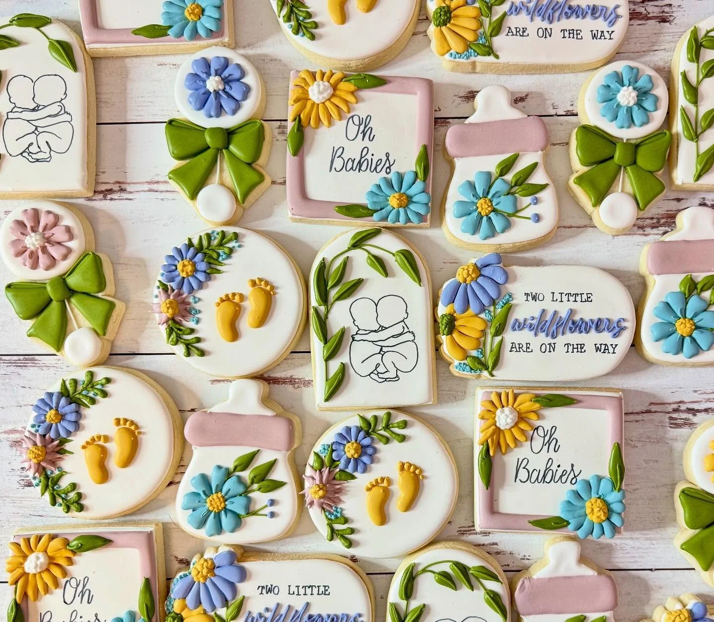 Congratulations to a special customer! It&rsquo;s Twins!! 🍼🤰👩&zwj;🍼👨&zwj;🍼 

#babyinbloomcookies #wildflowercookies #jojoscookieboutique #babyshowercookies #decoratedcookiesofinstagram