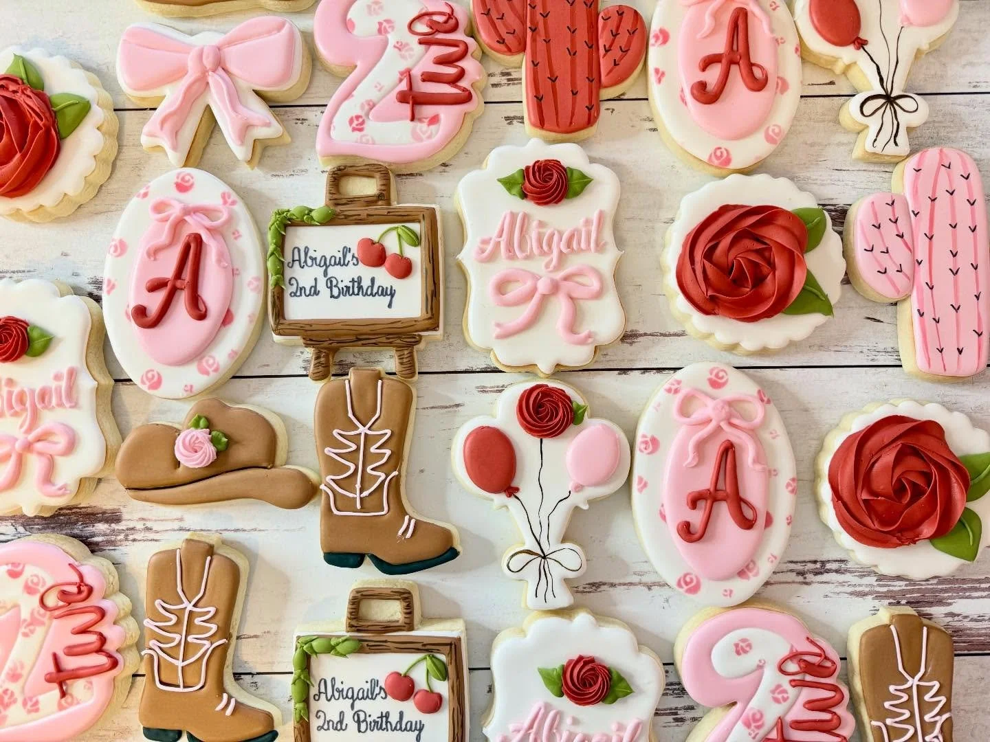 Happy 2nd birthday Abigail! I hope you liked your &ldquo;Two Dozen Roses&rdquo; cookies! 

(Inspo invitation in last image) 

#twodozenroses #twodozenrosescookies #jojoscookieboutique #decoratedcookiesofinstagram #partyfavors #blairsvillega