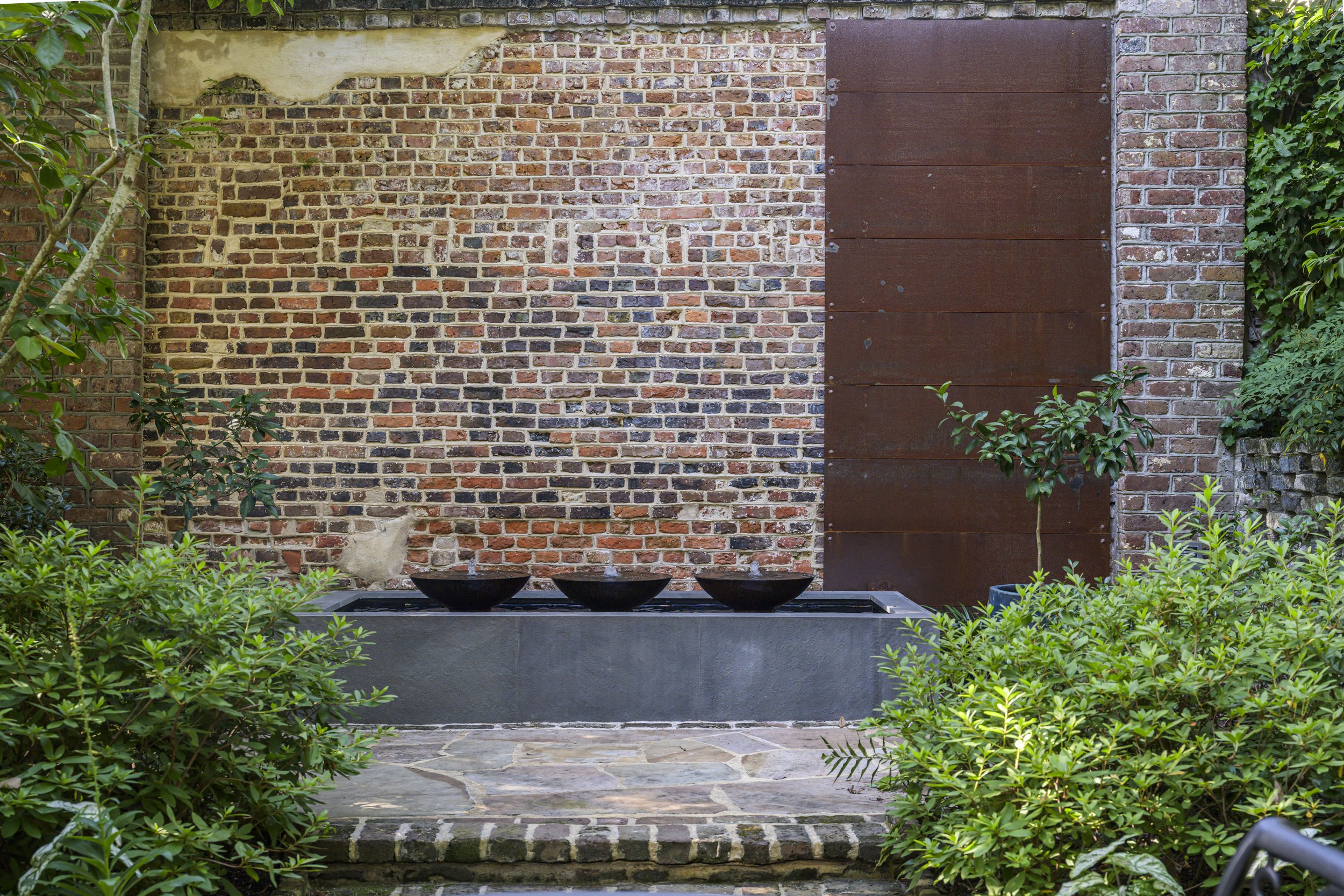 Historic Courtyard Wall and Fountain