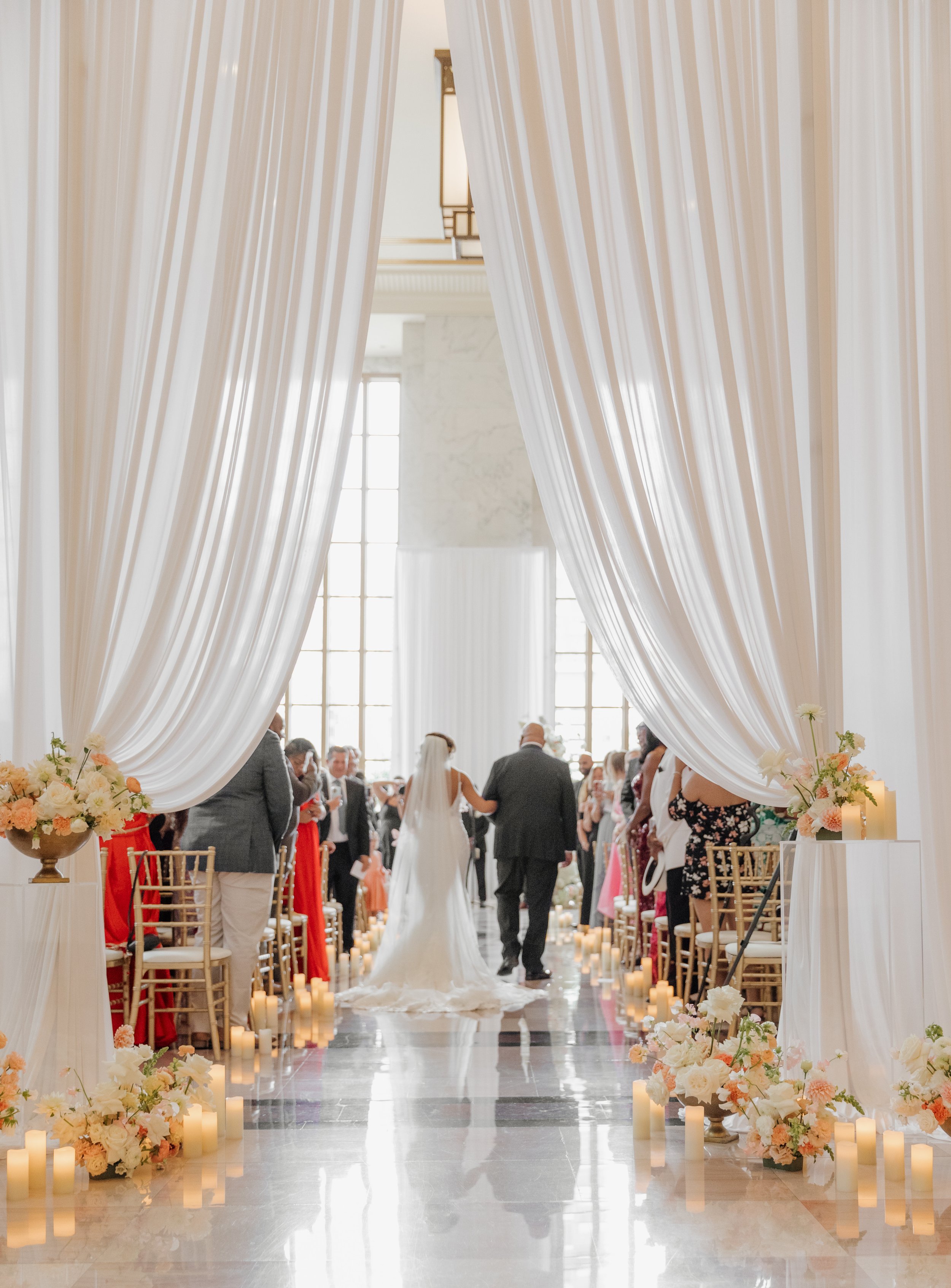 Danielle and Tim's wedding epitomized luxury and sophistication, meticulously orchestrated by Details Chicago. Hosted in a premier Chicago venue, the celebration showcased opulent floral arrangements, exquisite décor, and a refined ambiance. The even