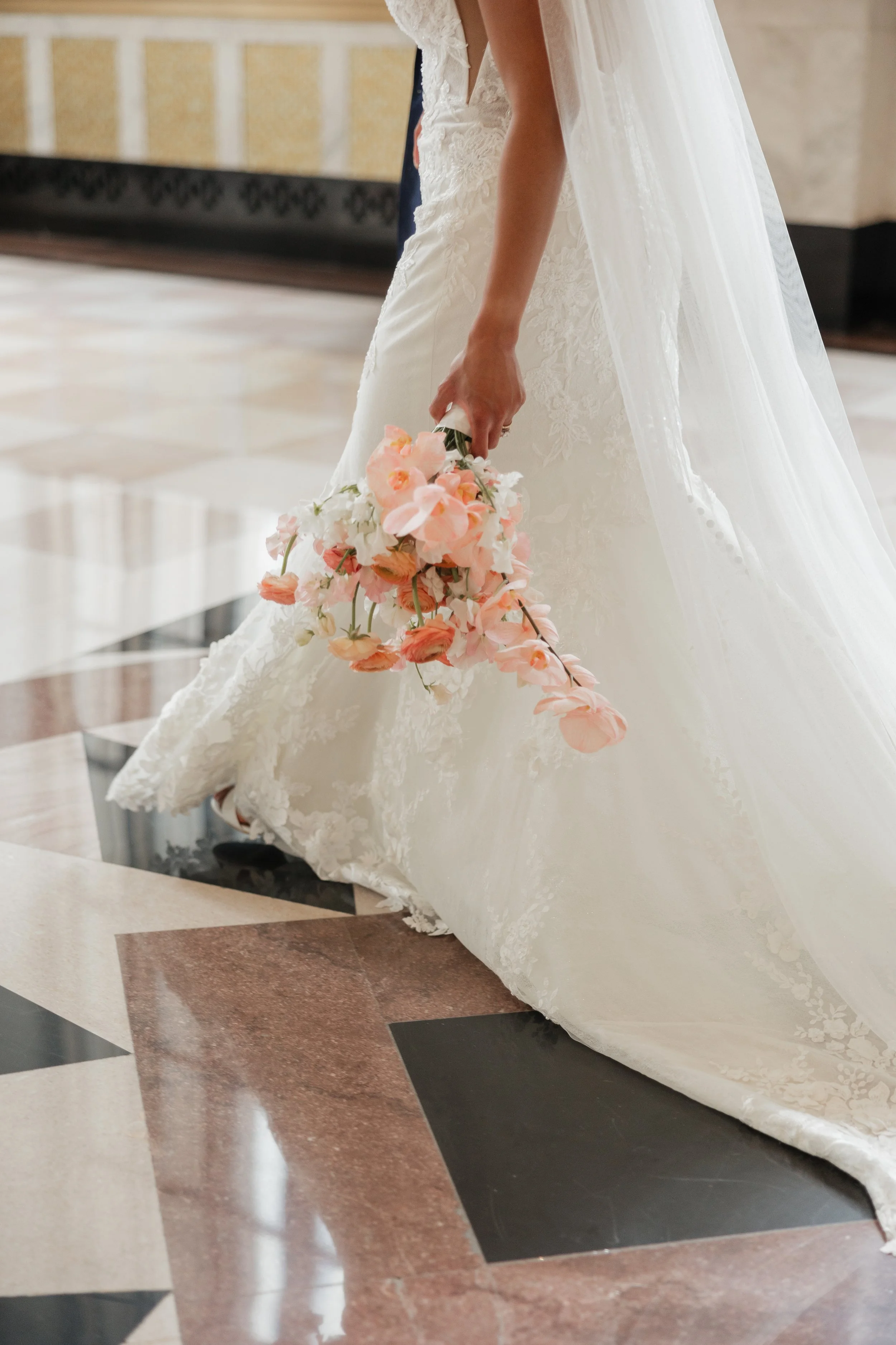 Danielle and Tim's wedding epitomized luxury and sophistication, meticulously orchestrated by Details Chicago. Hosted in a premier Chicago venue, the celebration showcased opulent floral arrangements, exquisite décor, and a refined ambiance. The even