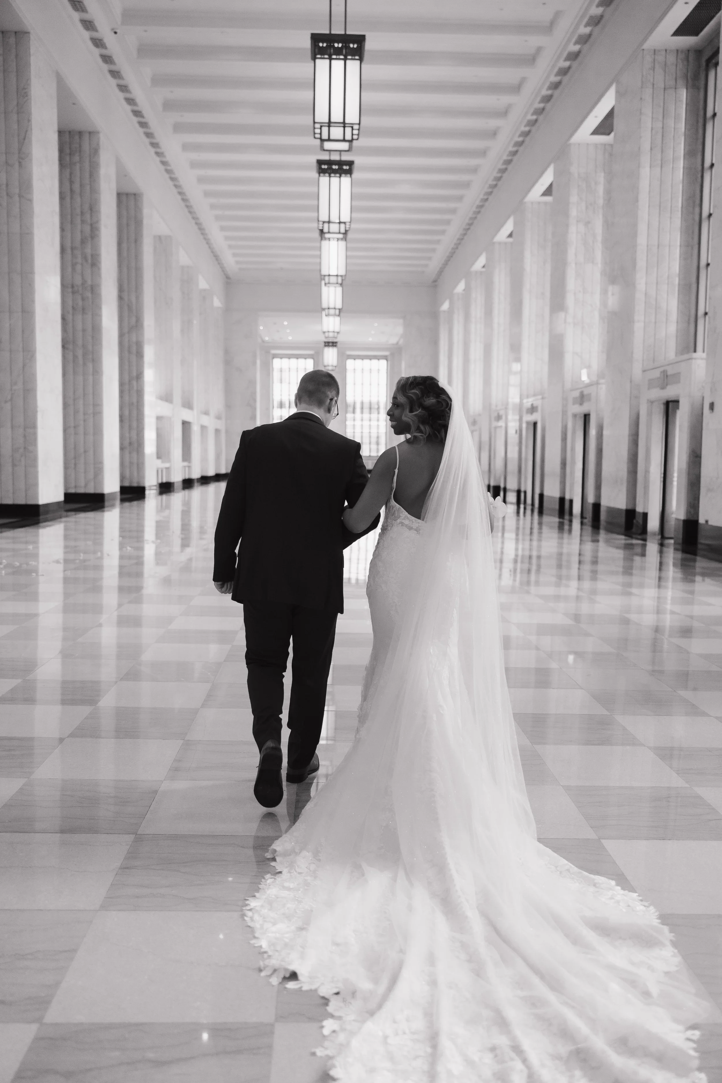 Danielle and Tim's wedding epitomized luxury and sophistication, meticulously orchestrated by Details Chicago. Hosted in a premier Chicago venue, the celebration showcased opulent floral arrangements, exquisite décor, and a refined ambiance. The even