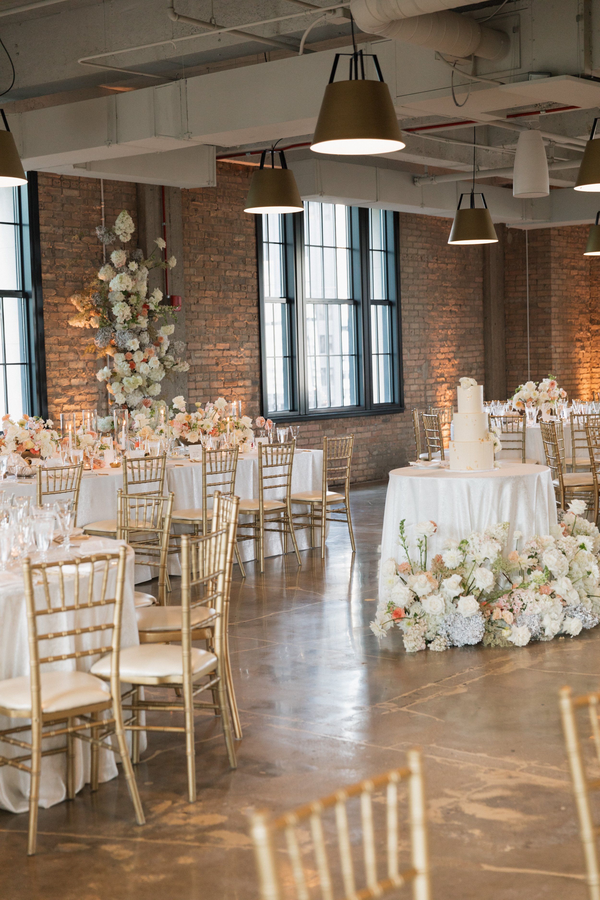 Danielle and Tim's wedding epitomized luxury and sophistication, meticulously orchestrated by Details Chicago. Hosted in a premier Chicago venue, the celebration showcased opulent floral arrangements, exquisite décor, and a refined ambiance. The even