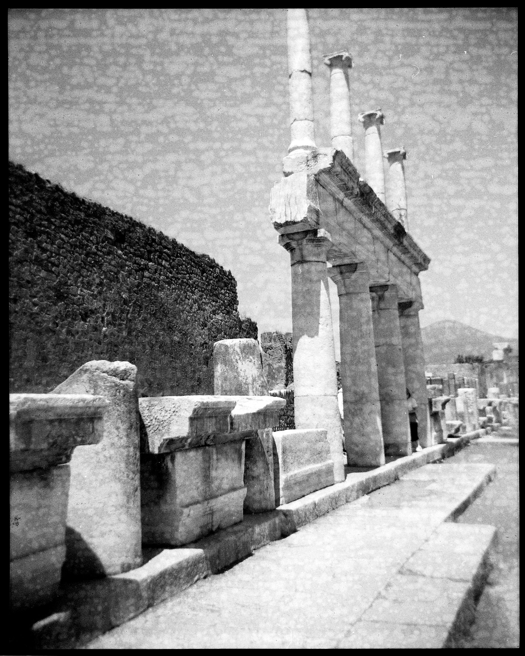 Holga camera makes the image look like it was taken in the late 1800's.