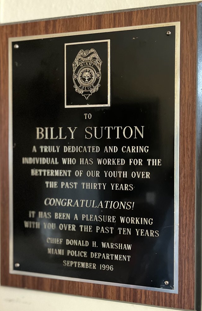 Major Gerald Darling and Judge Liam Fritel deliver this plaque on behalf of Chief Donald Warshaw to Billy at a celebration of his life Infront of 1000 guests at the Tally Ho in Birmingham 1996