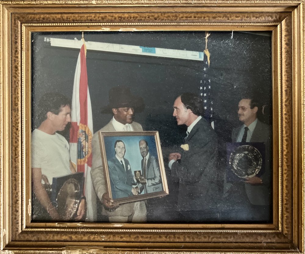 Billy commissioned the painting of Chief Dickson and Billy receiving the west midlands police plaque 1986. It hangs in the chiefs home to this day.
"Clarence you look younger than me on the painting - I will have a few words to say to the artist". B