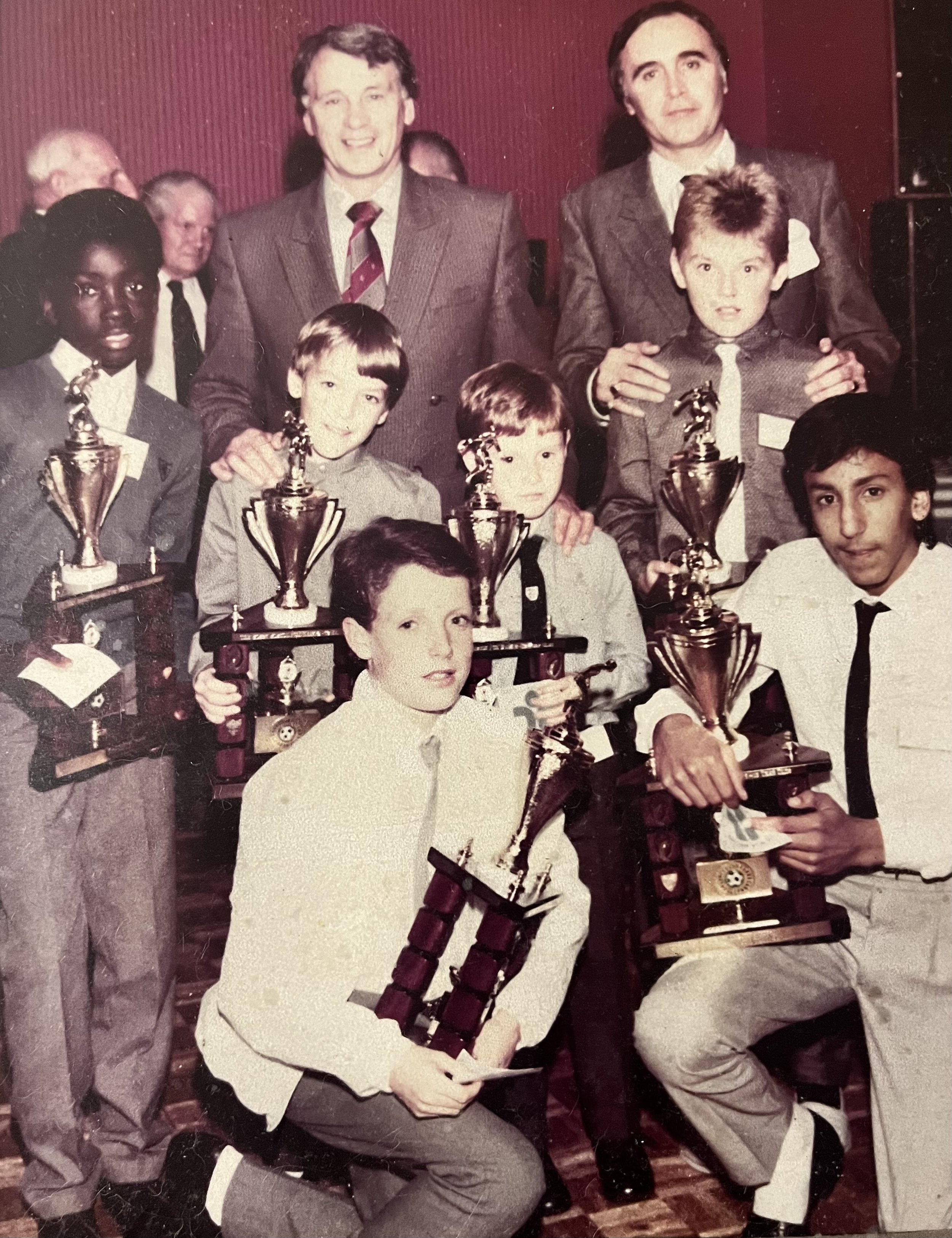 Billy sponsored all the trophies for the Bobby Robson Soccer Week, here he is with the great England manager Bobby Robson and the winners of the trophies, some whom went on to play professionally.