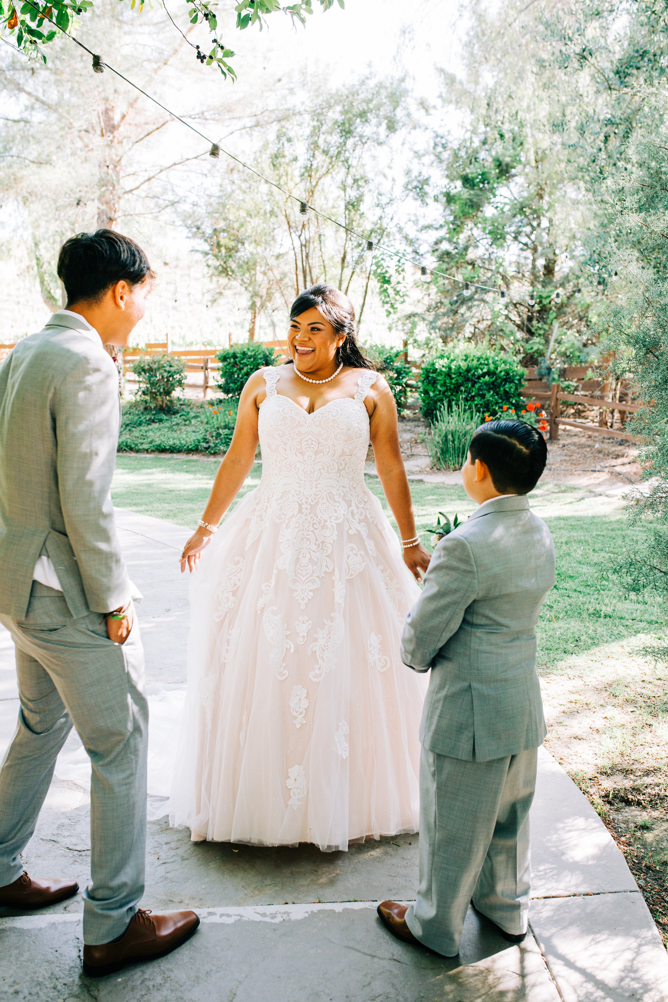 bride first look with her sons.jpg