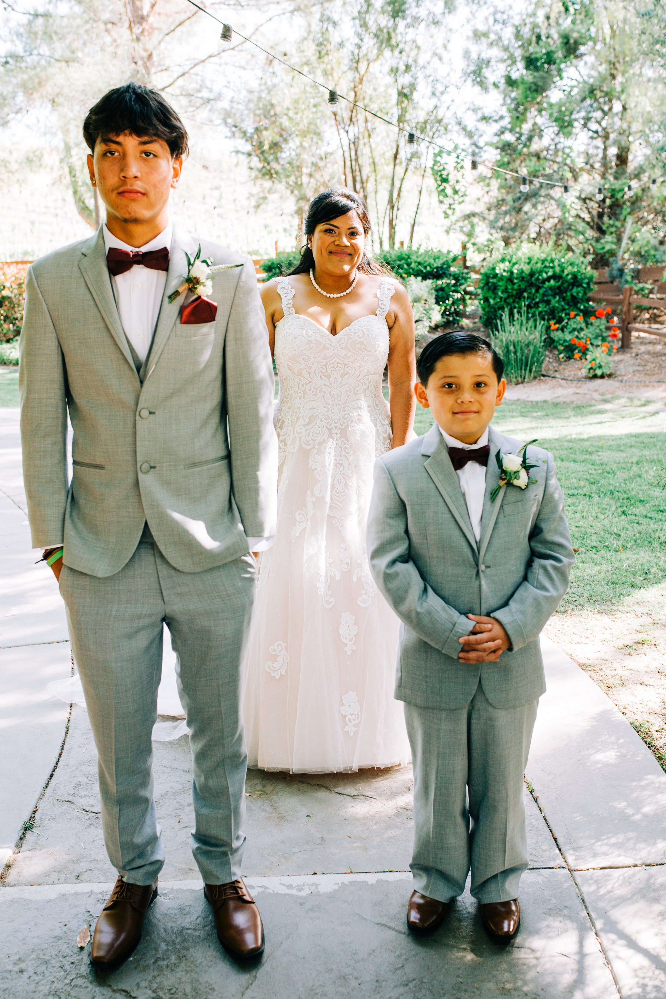 bride first look with sons.jpg