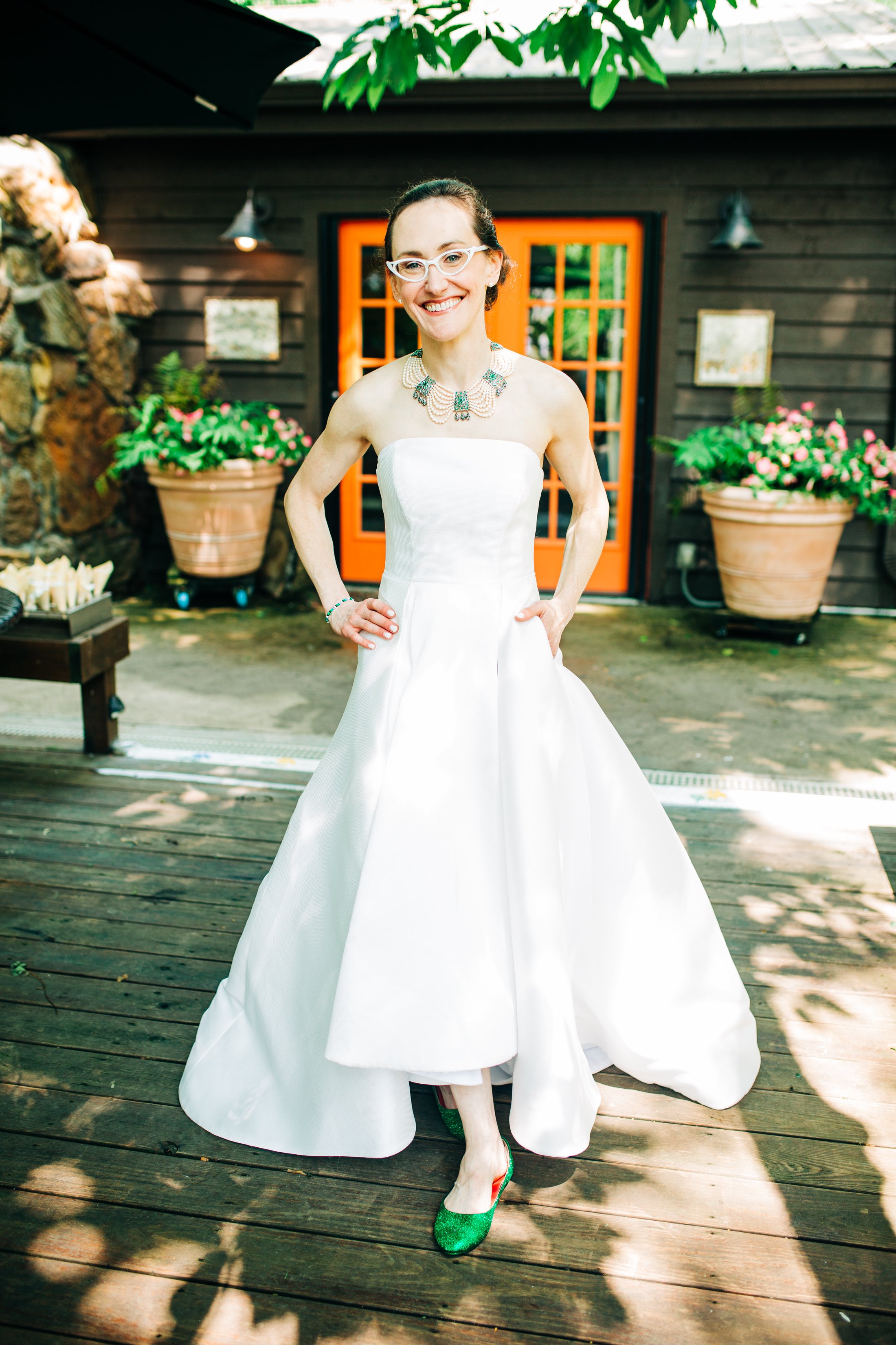 bride with emerald green shoes garden wedding heber springs.jpg