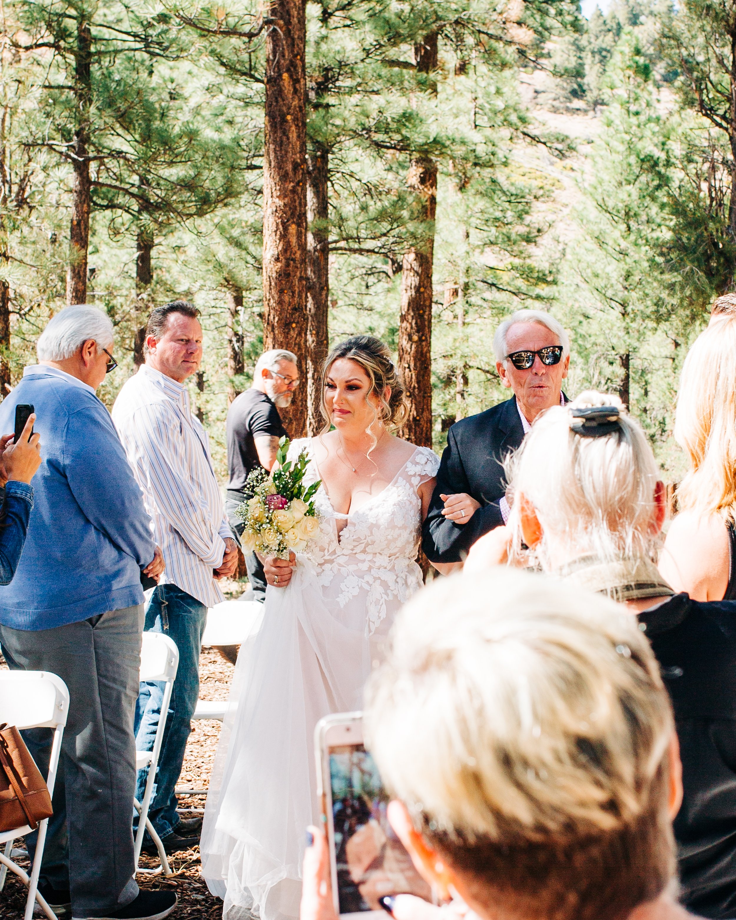 bride walking down the aisle with father.jpg