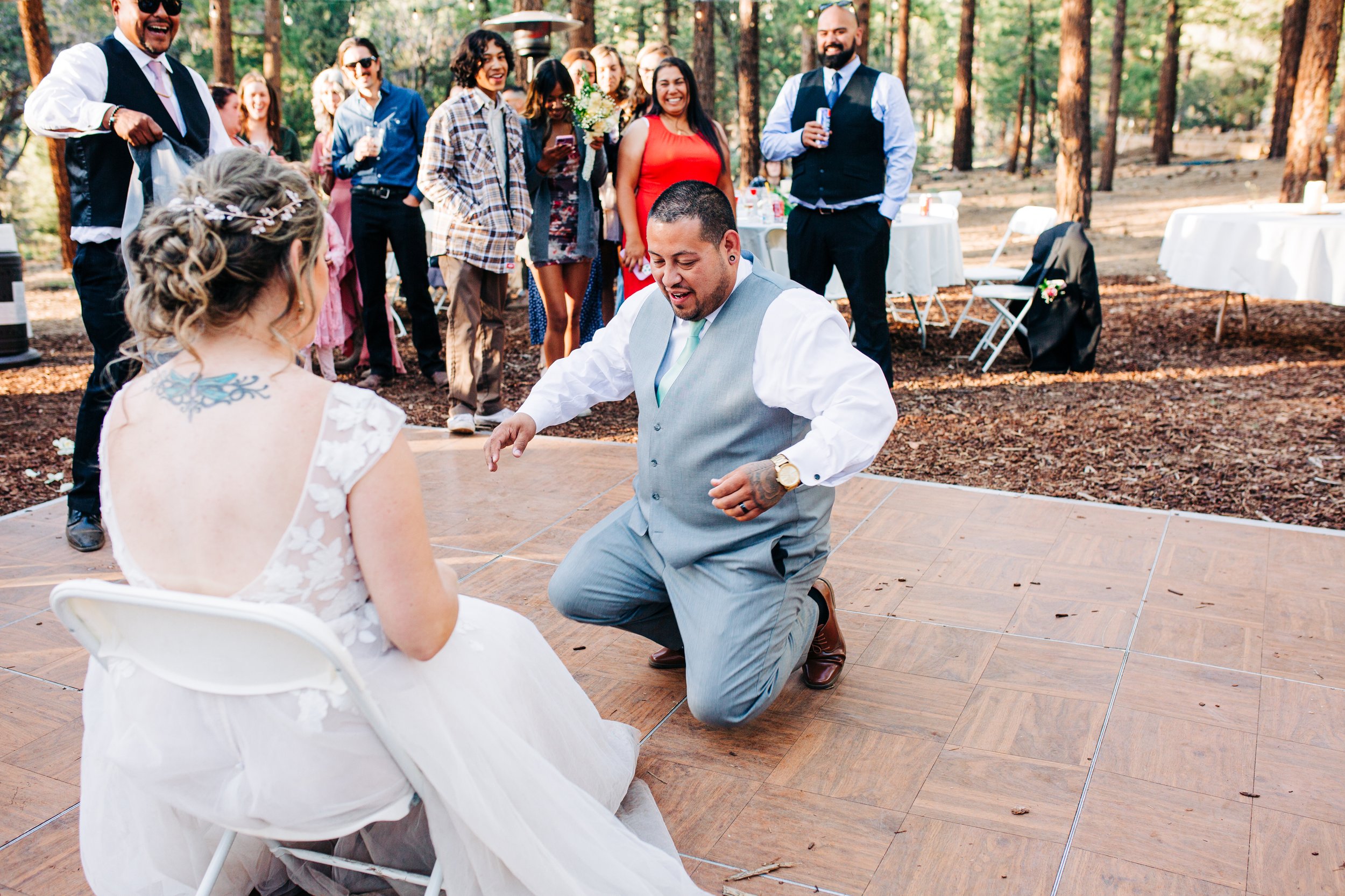 groom getting garter.jpg