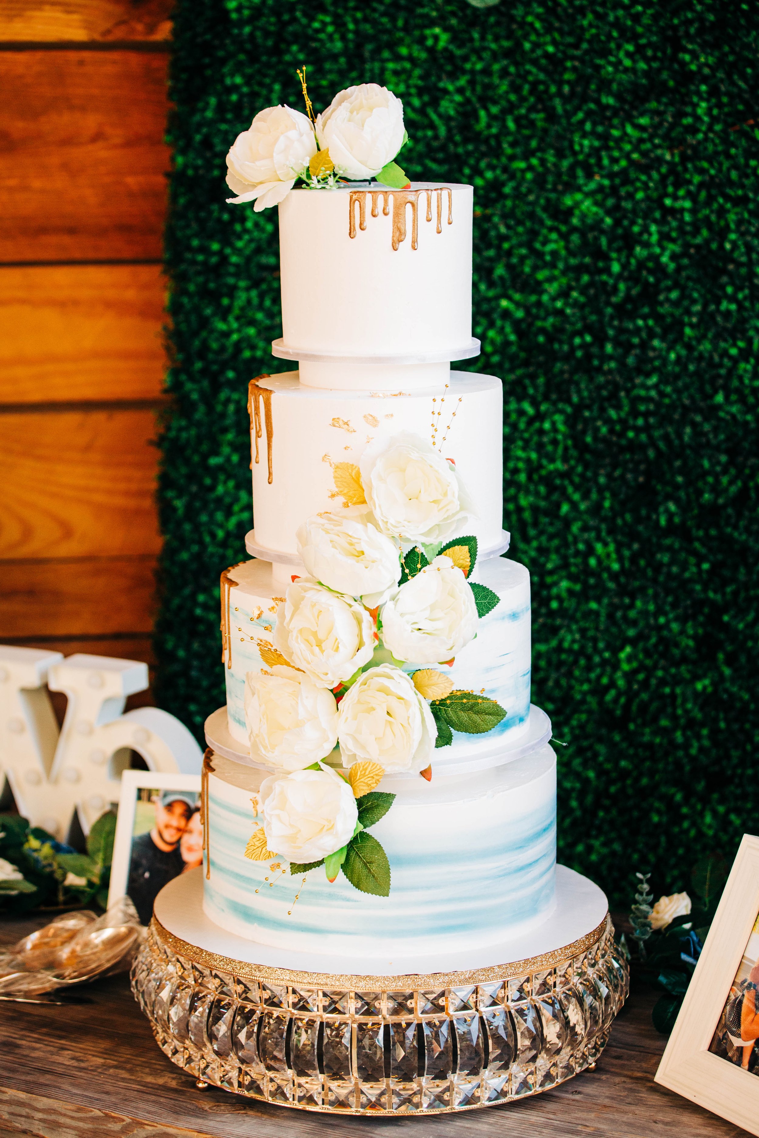 4 tier dusty blue wedding cake.jpg