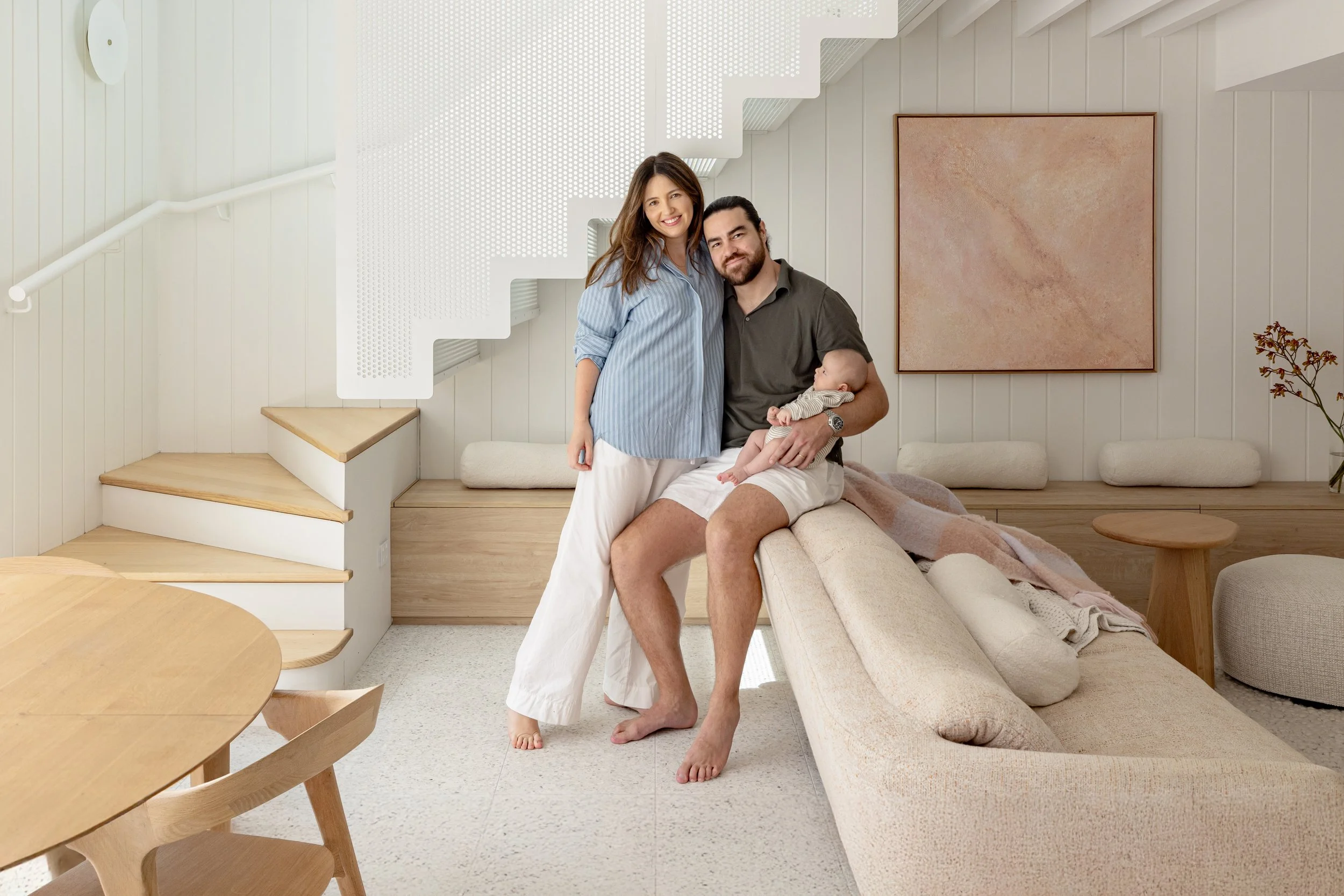 Happy clients in their newly renovated home.