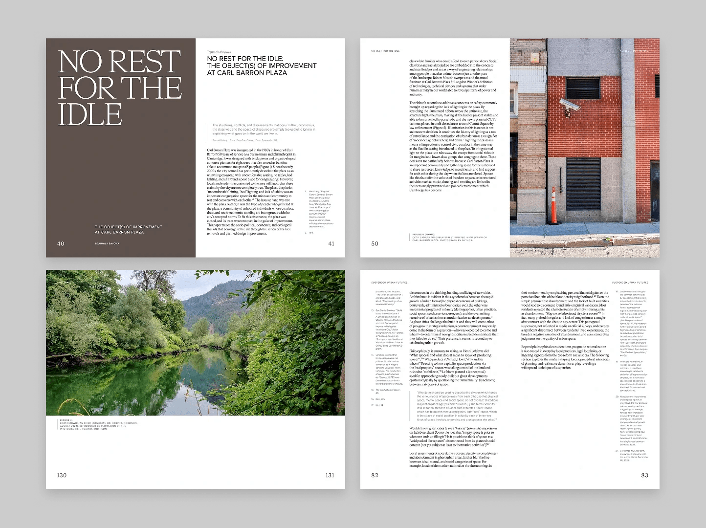 Photograph of a concrete alleyway with a security camera mounted on a wall, brick and concrete buildings, and an orange traffic cone.