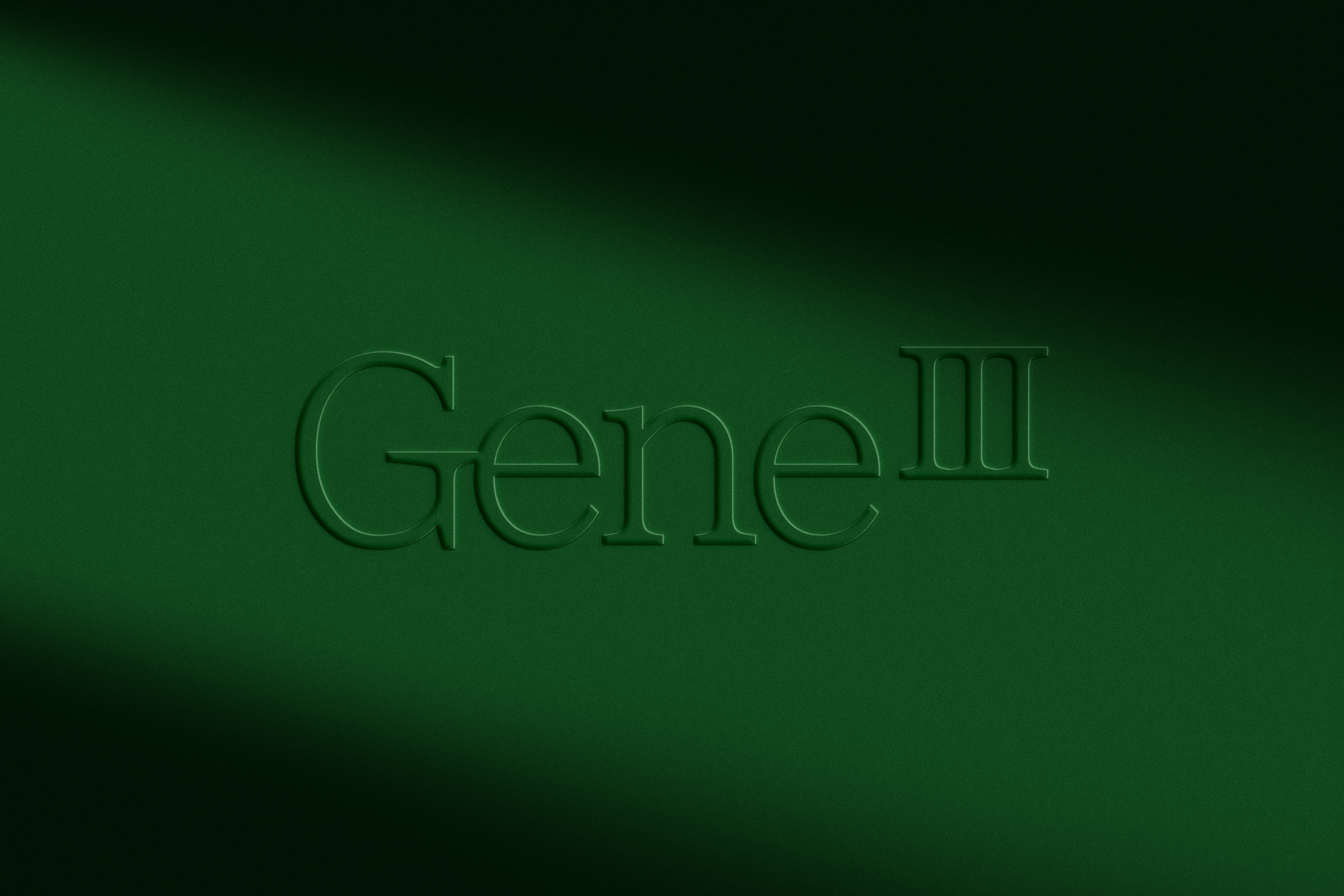 Embossed green background with the word 'Gene II' in raised letters.