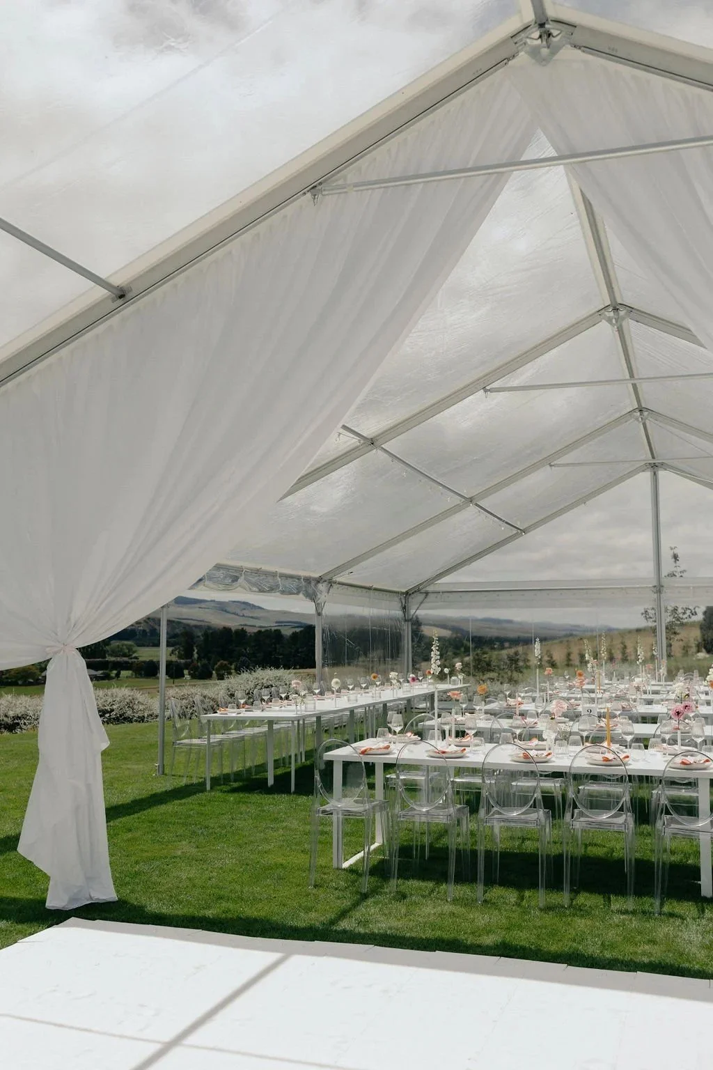 Inside the clear marquee looking out to the garden – Loula clear marquee hire, Canterbury