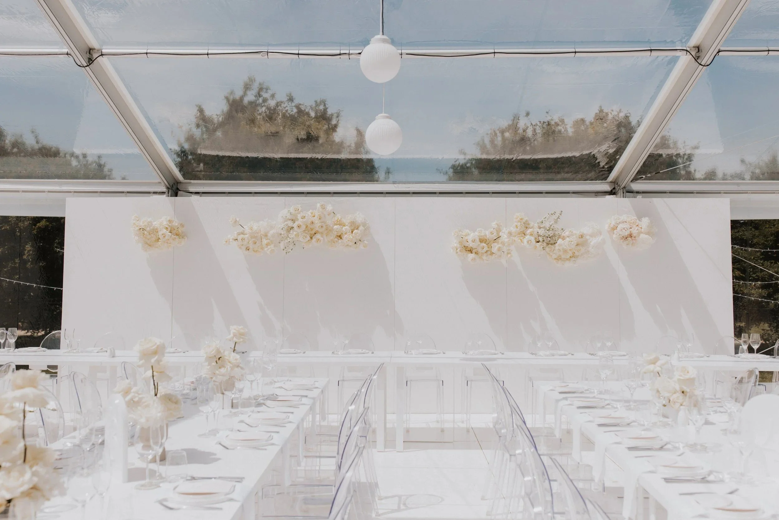 Clear marquee draped in white for an elegant reception – Loula clear marquee hire, Canterbury