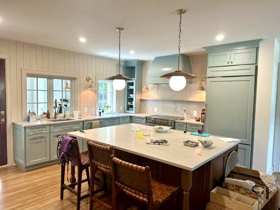 Kitchen island with pendant lighting in Arlington, VA