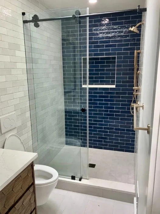 Bathroom with gold shower fixtures in Arlington, VA