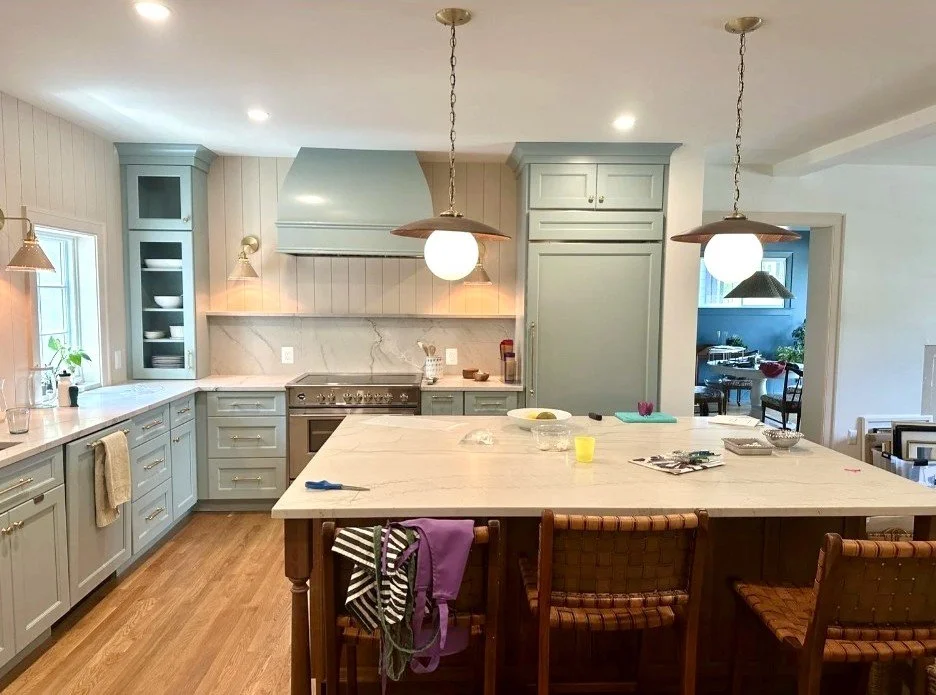 Kitchen island with pendant lighting in Arlington, VA