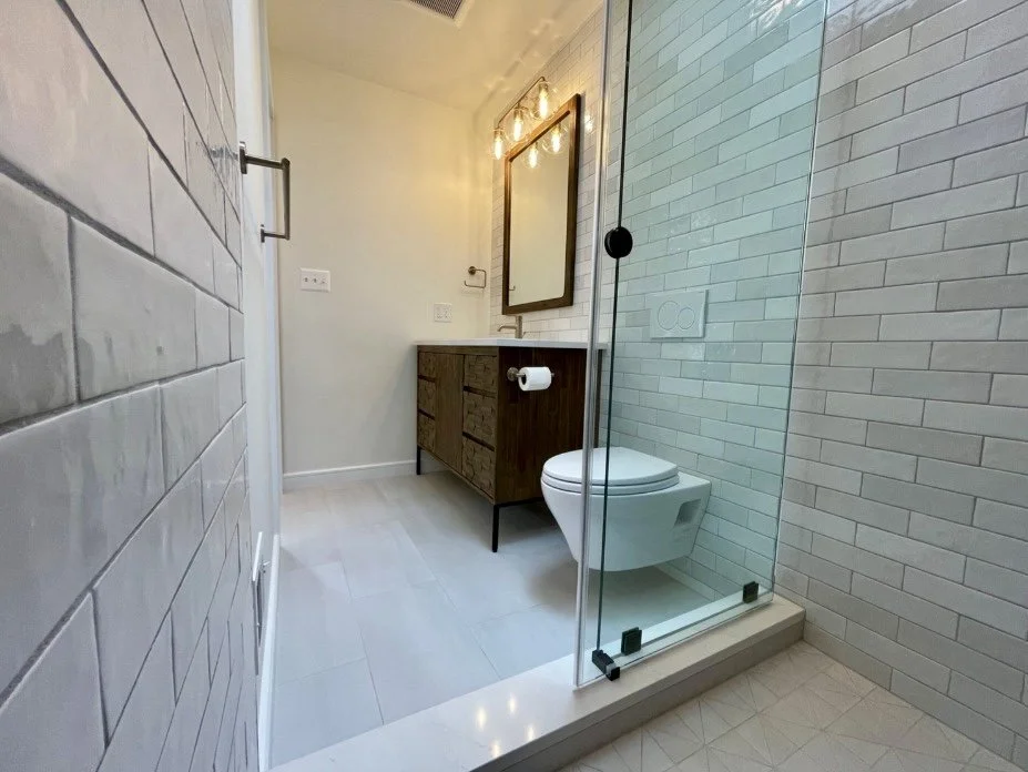 Bathroom with Walnut vanity and in-wall toilet in Arlington, VA