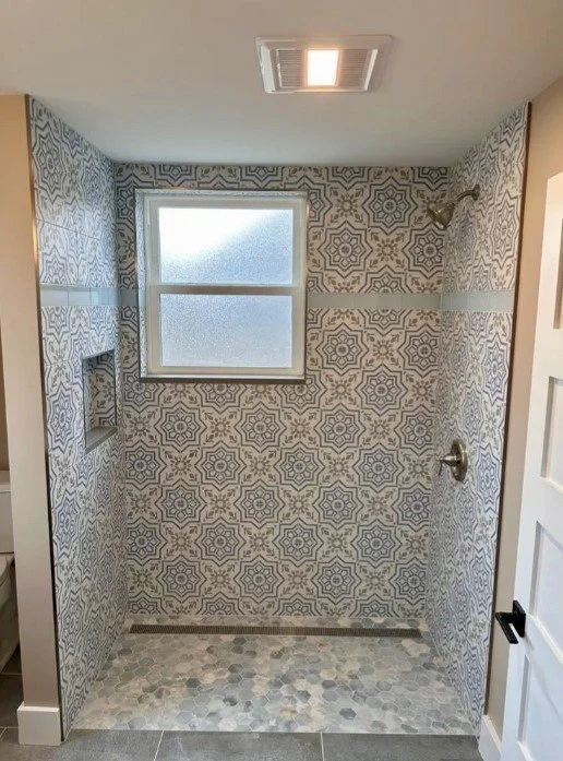 Bathroom with a curbless shower and linear drain in Arlington, VA