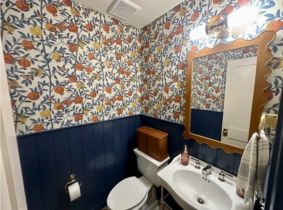 Powder room with wallpaper in Arlington, VA