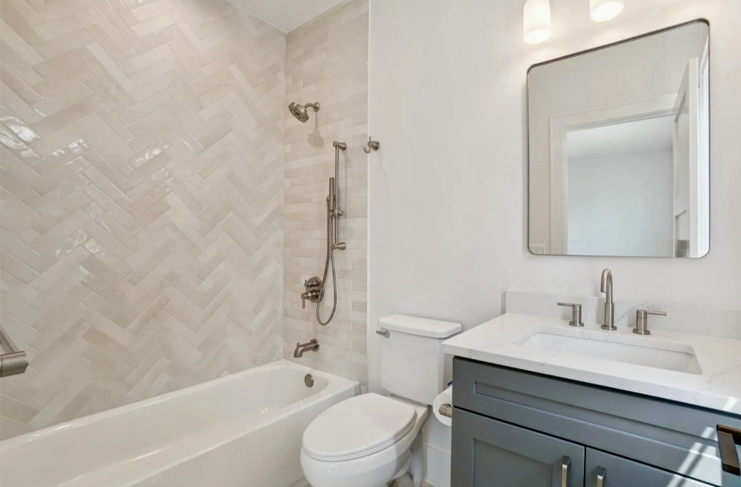 Designer Tile Herringbone Pattern and Custom Bathroom Vanity in Arlington, VA